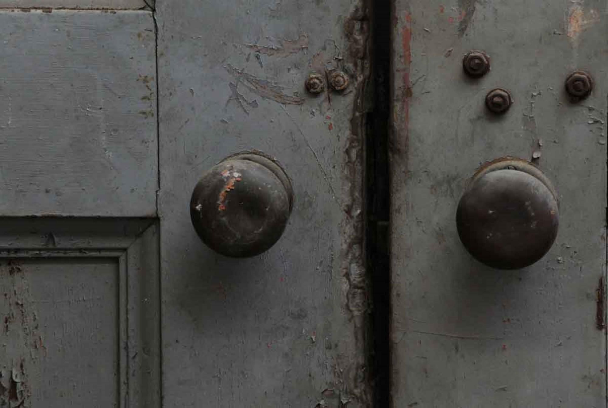 Steel clad double distressed industrial doors with recessed panels from the early 1900s. Includes hardware. Priced is for the pair. This can be seen at our 400 Gilligan St location in Scranton, PA.