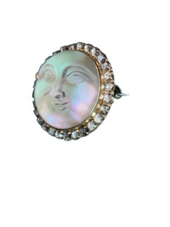 Early 1900s 9K Gold “Man in the Moon” Carved Glass Brooch with Paste Halo