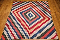 Early 1900s American Pieced Quilt in Sawtooth Square Pattern with Calico Prints