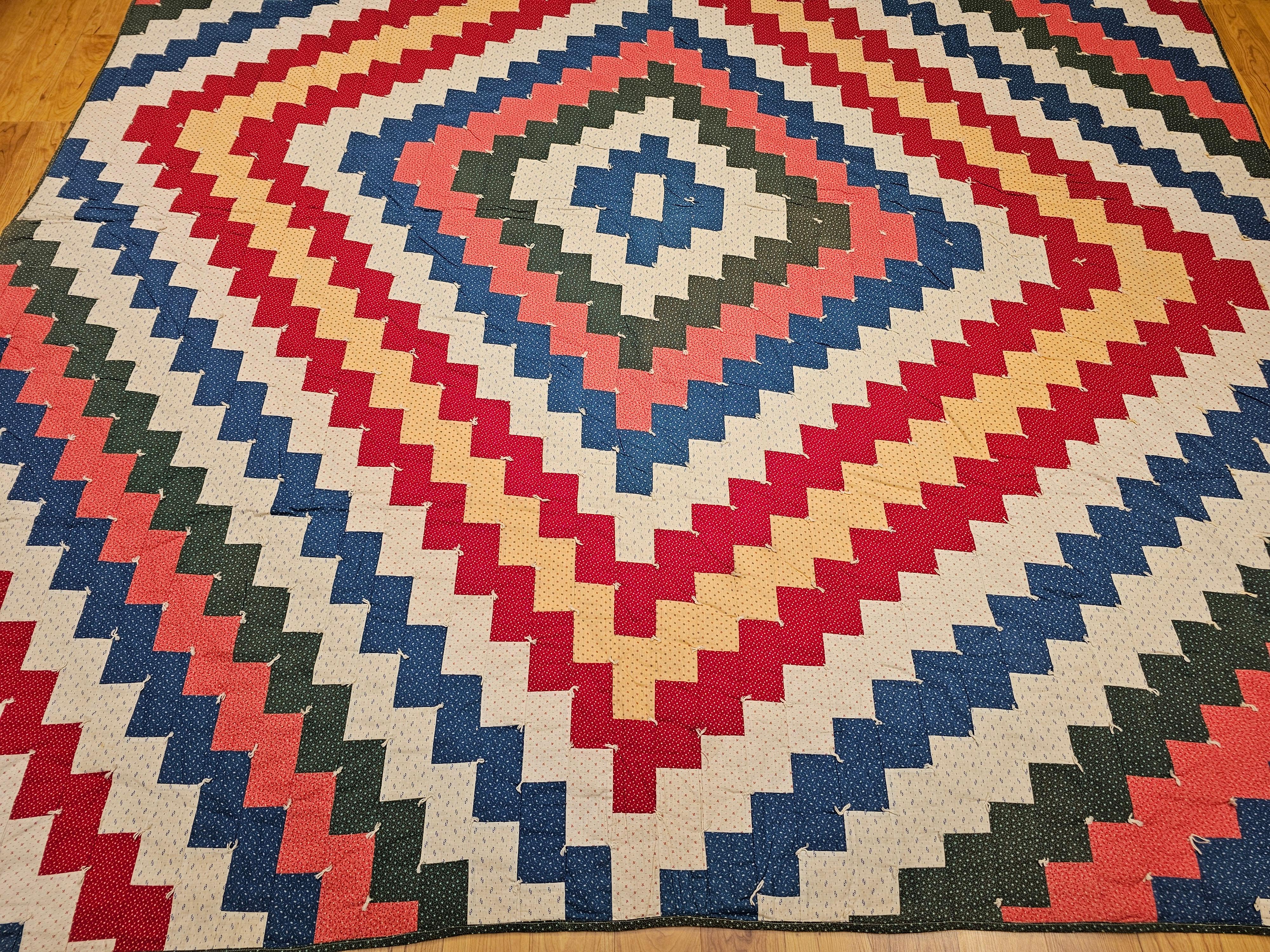 Hand-Crafted Early 1900s American Pieced Quilt in Sawtooth Square Pattern with Calico Prints For Sale