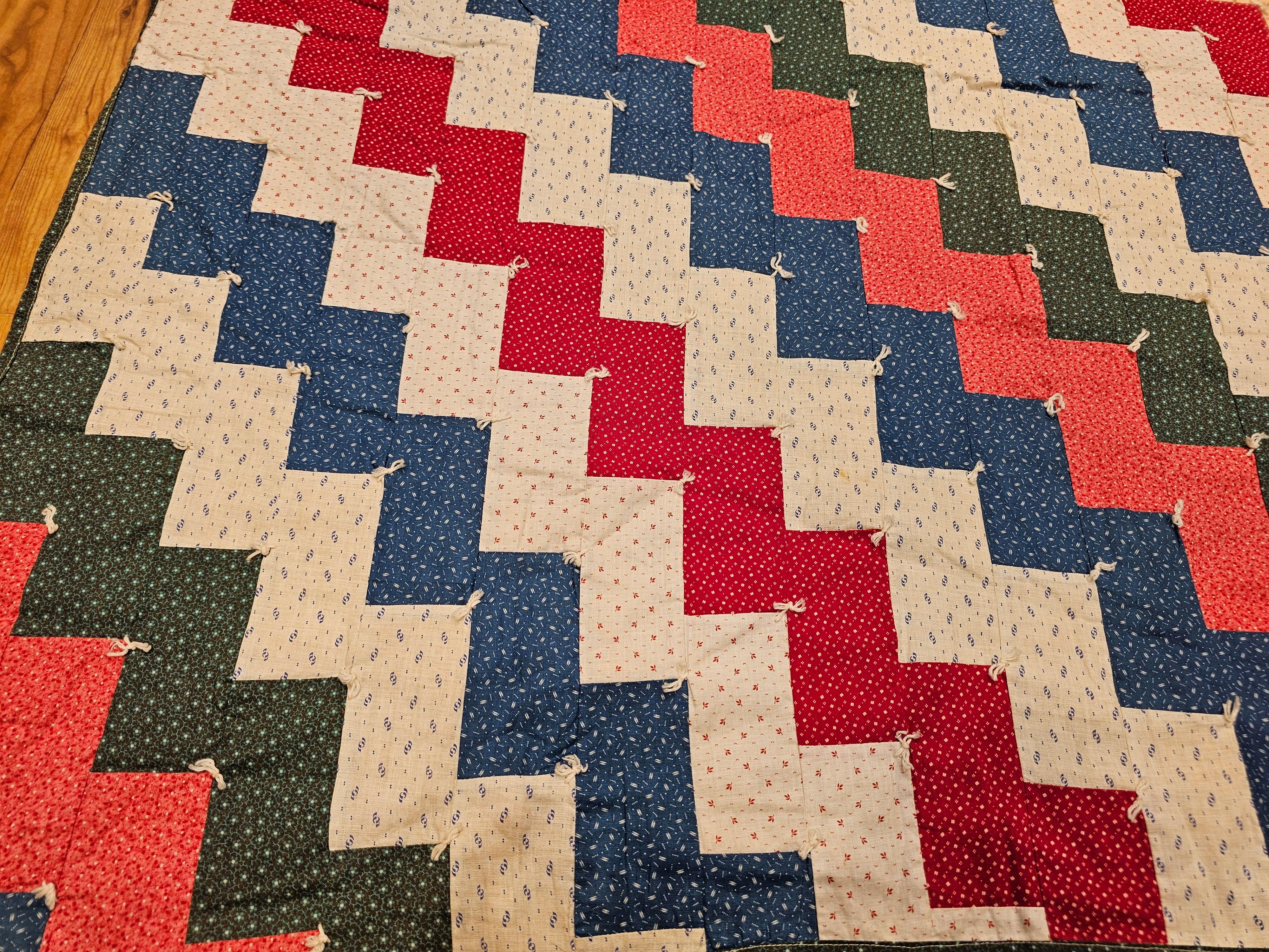 Cotton Early 1900s American Pieced Quilt in Sawtooth Square Pattern with Calico Prints For Sale
