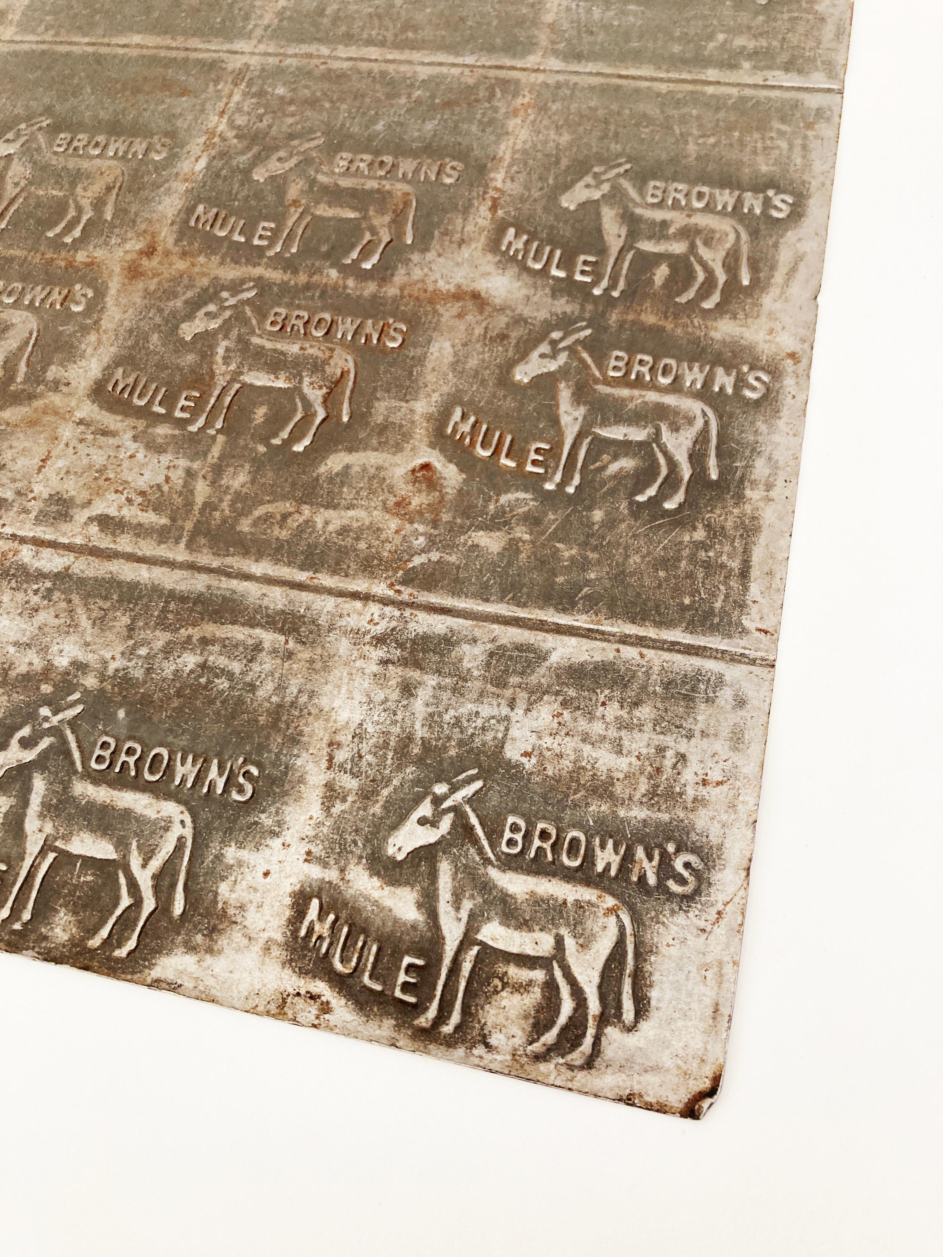 Brown’s Mule was one of the most famous American chewing tobacco brands of its time. Factory tools rarely survived-most were discarded or melted. Plates like this were used from 1910 to 1935 to imprint the brand name into pressed tobacco bricks.