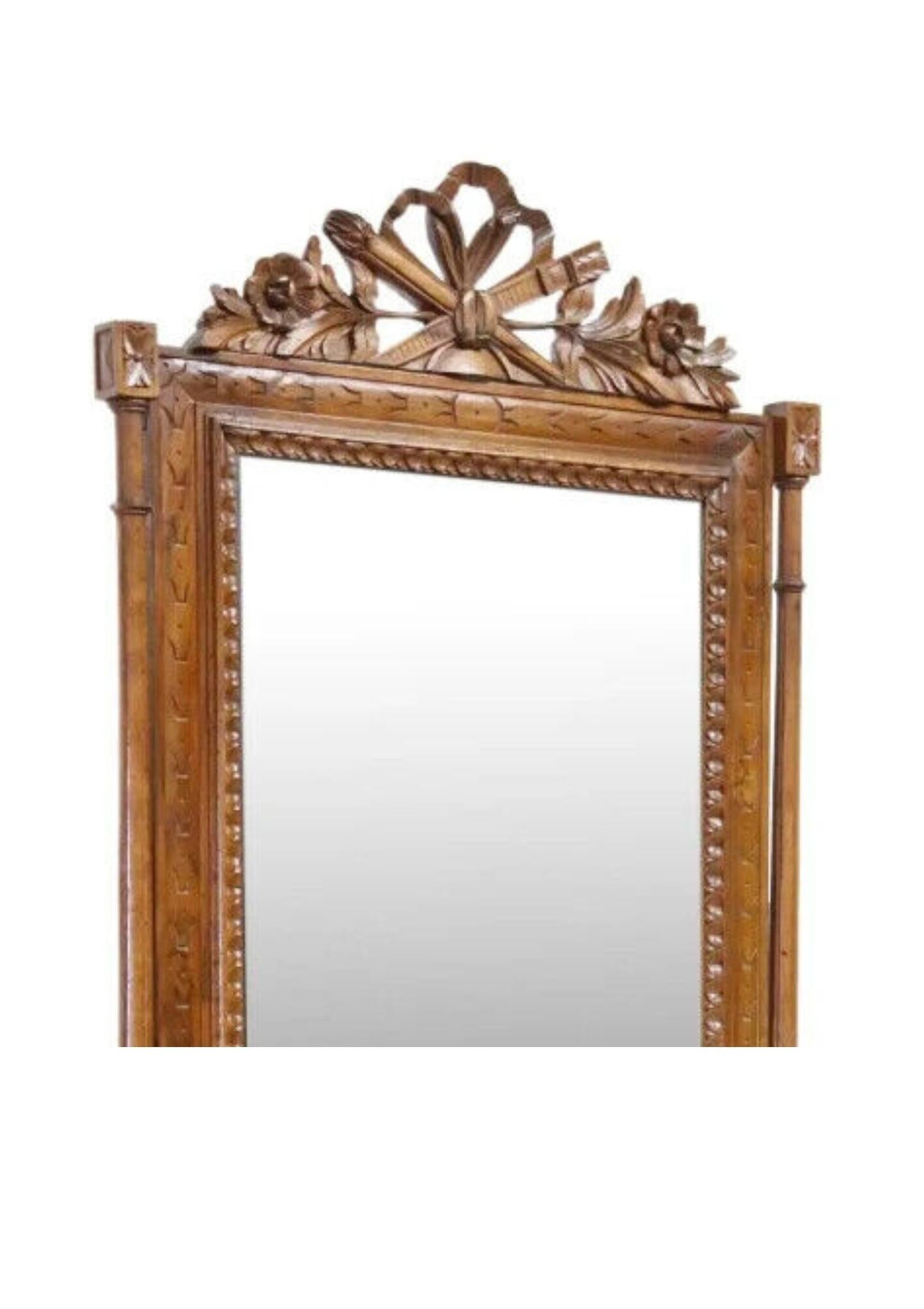 Stunning Antique Hall Stand, Mirrored, Italian  Carved, Walnut, Beveled Mirror, E. 1900's, 20th C. 

Italian carved walnut mirrored hall stand, early 20th c., having torch and quiver crest with floral motifs, over central beveled mirror plate,