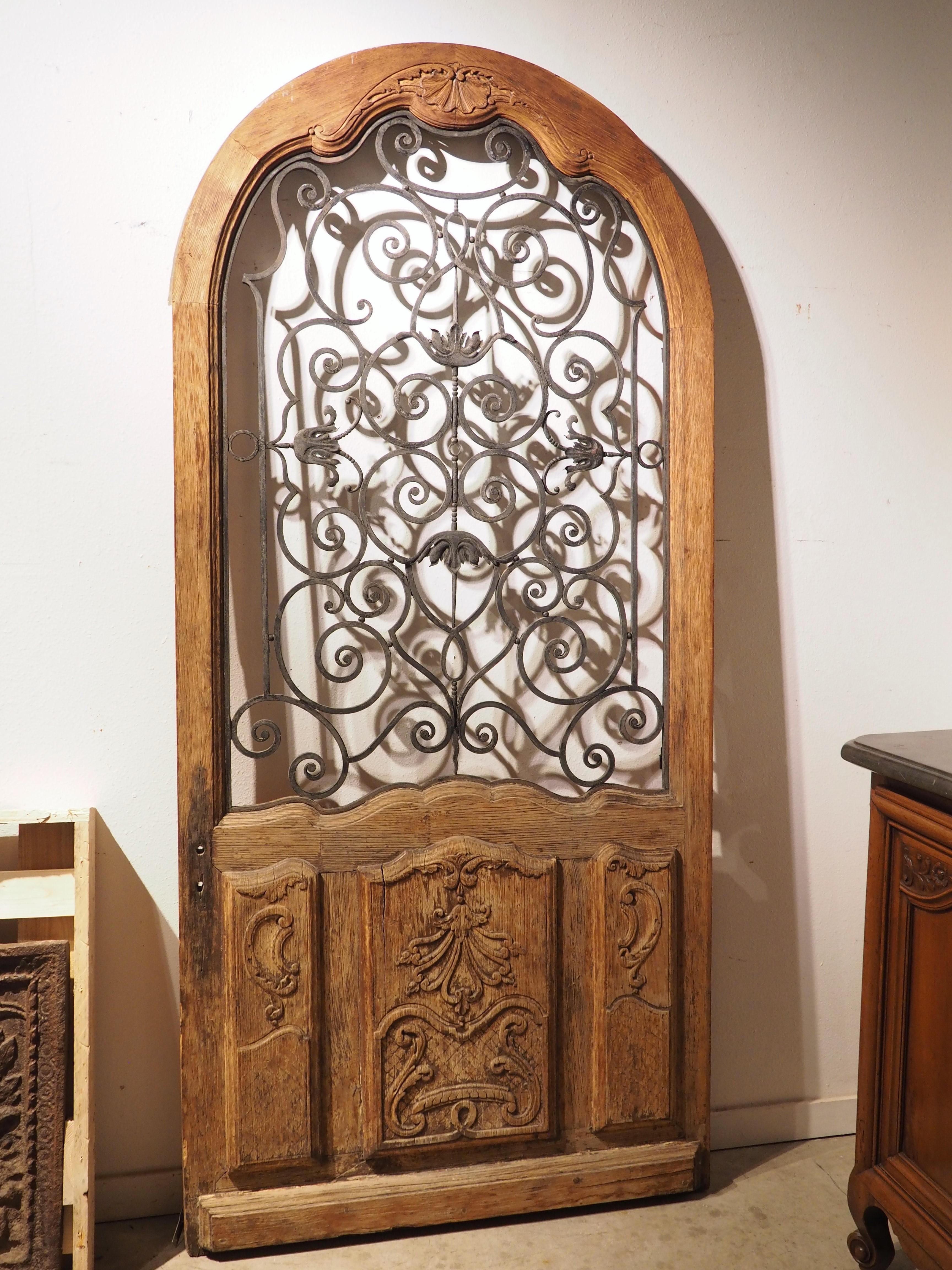Early 1900s Arched Oak and Iron Entry Door from France 3