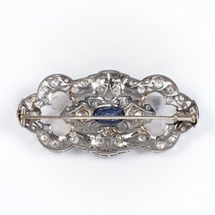 Early 1900s Art Deco 18 Karat White Gold Brooch with Sapphire and Diamonds
