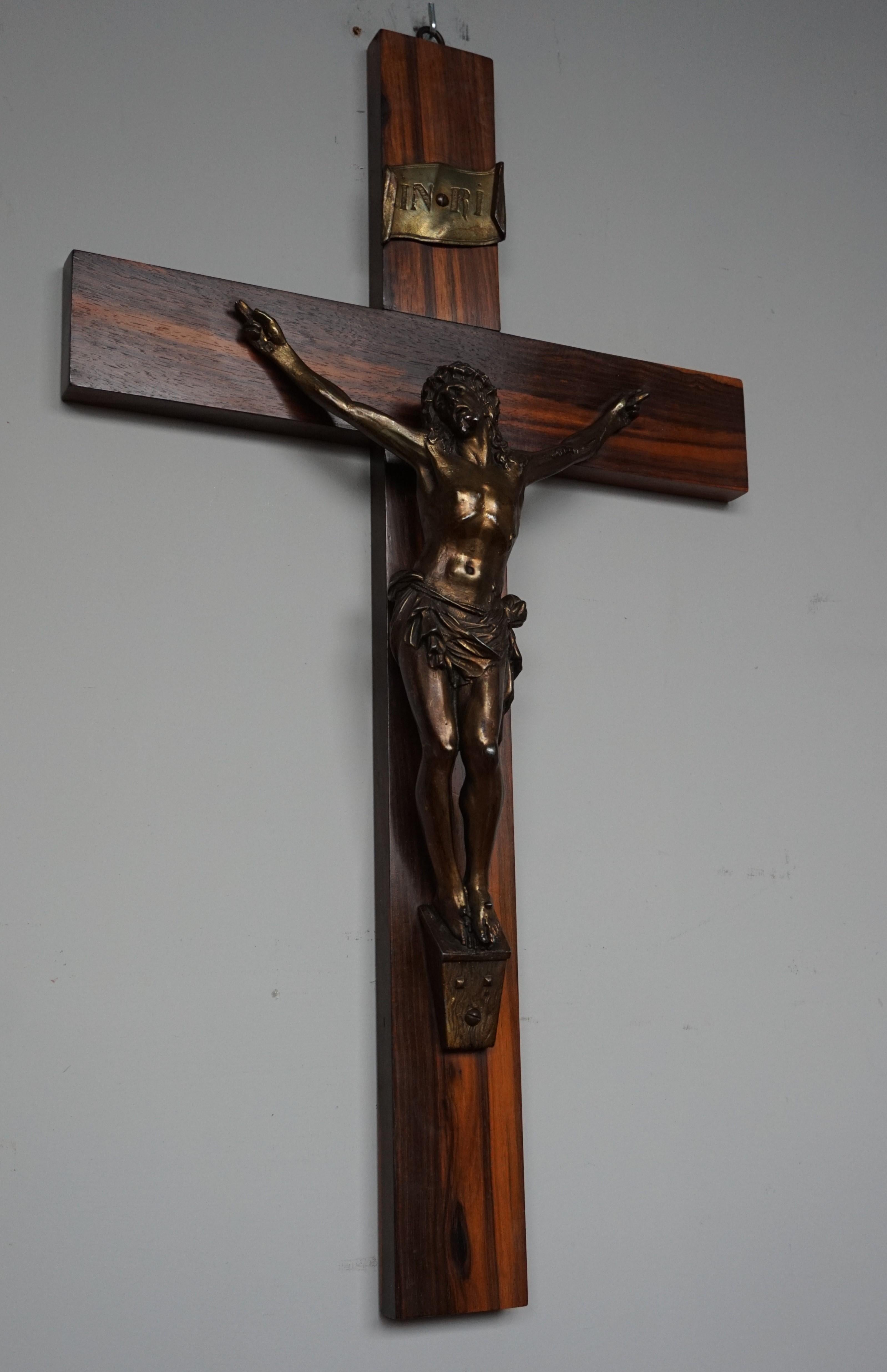 Rare and stunning wooden cross with a sculpture of Christ suffering.

This striking and good size crucifix is in original and very good condition. Most (young) people won't realize, but in order to spiritually and mentally grow in life, some