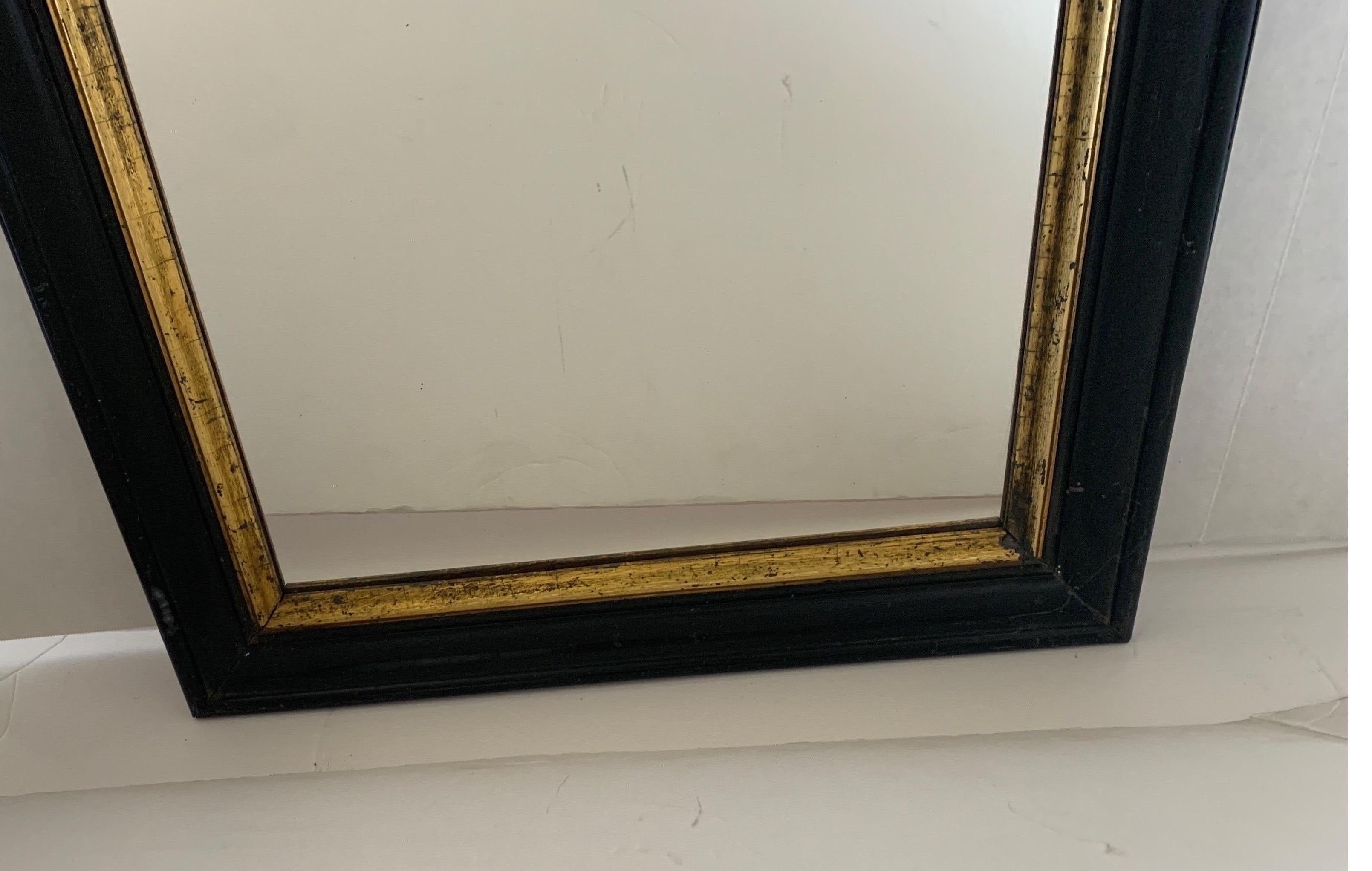 black picture frame with gold trim
