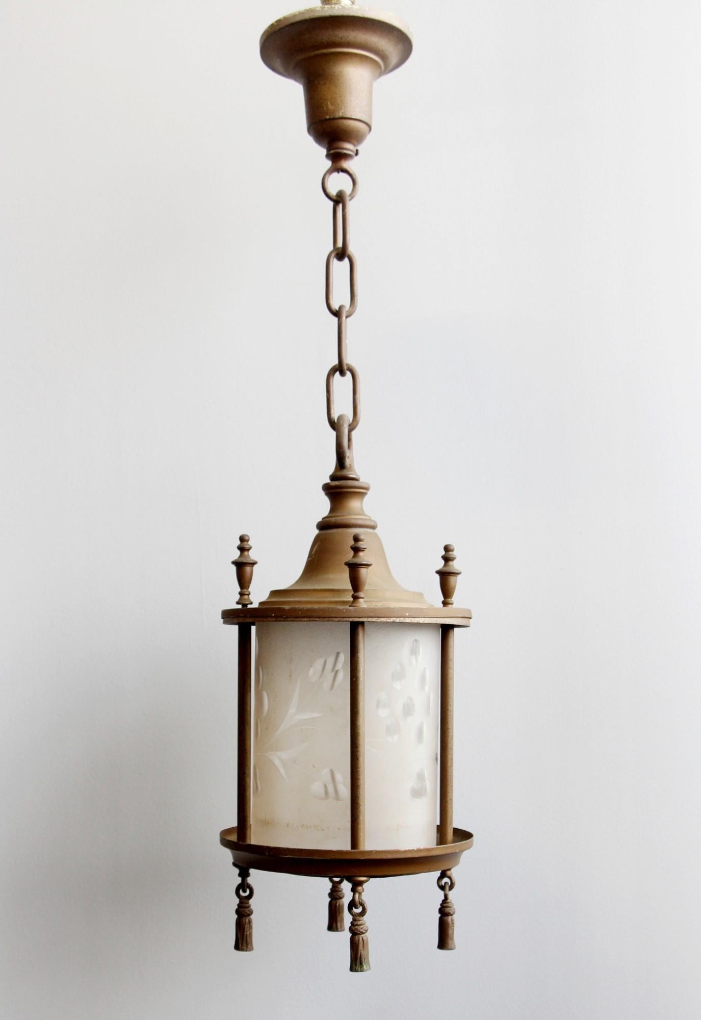 Brass cylinder shaped lantern from the early 20th century with original etched round cylinder glass shade. This can be seen at our 400 Gilligan St location in Scranton, PA.
