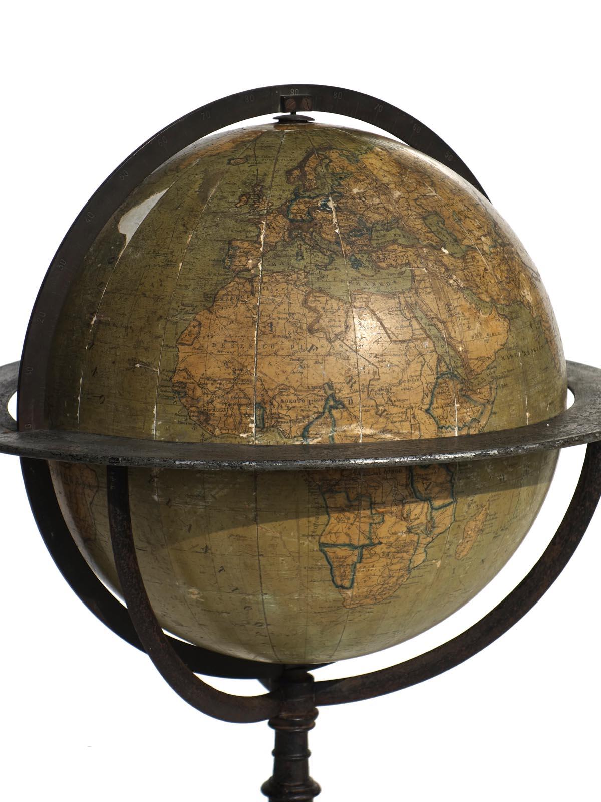 1905 terrestrial globe
Cast metal stand
Excellent condition.
 