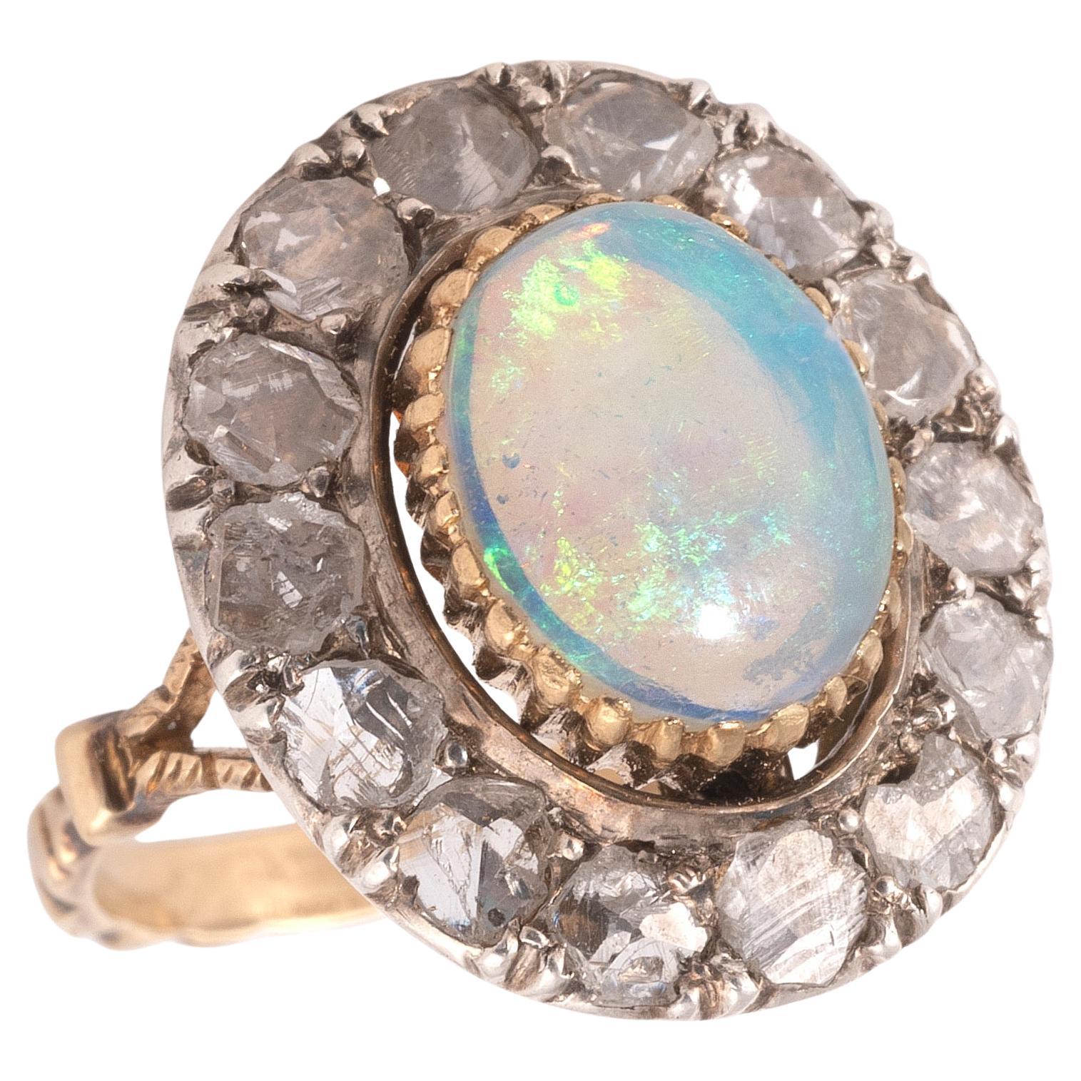 Early 1900
s Cabochon Opal And Rose Diamond Cluster Ring