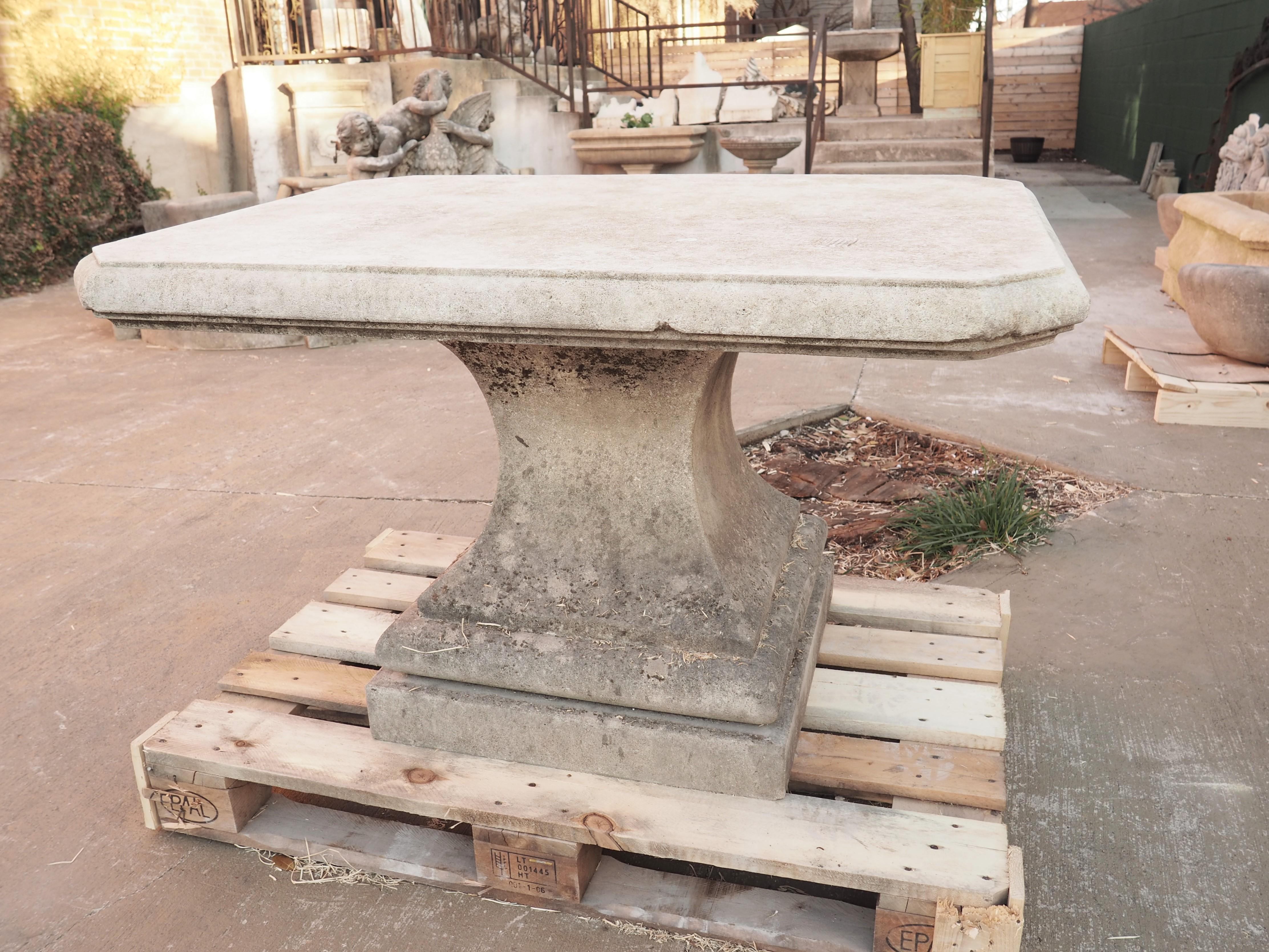 This lovely pedestal table features a 3 1/2-inch-thick top above a pedestal column. Hand-carved in Italy in the early 1900’s, the Vicenza limestone is light gray with white inclusions. It was recently purchased from a villa near Venice on Riviera
