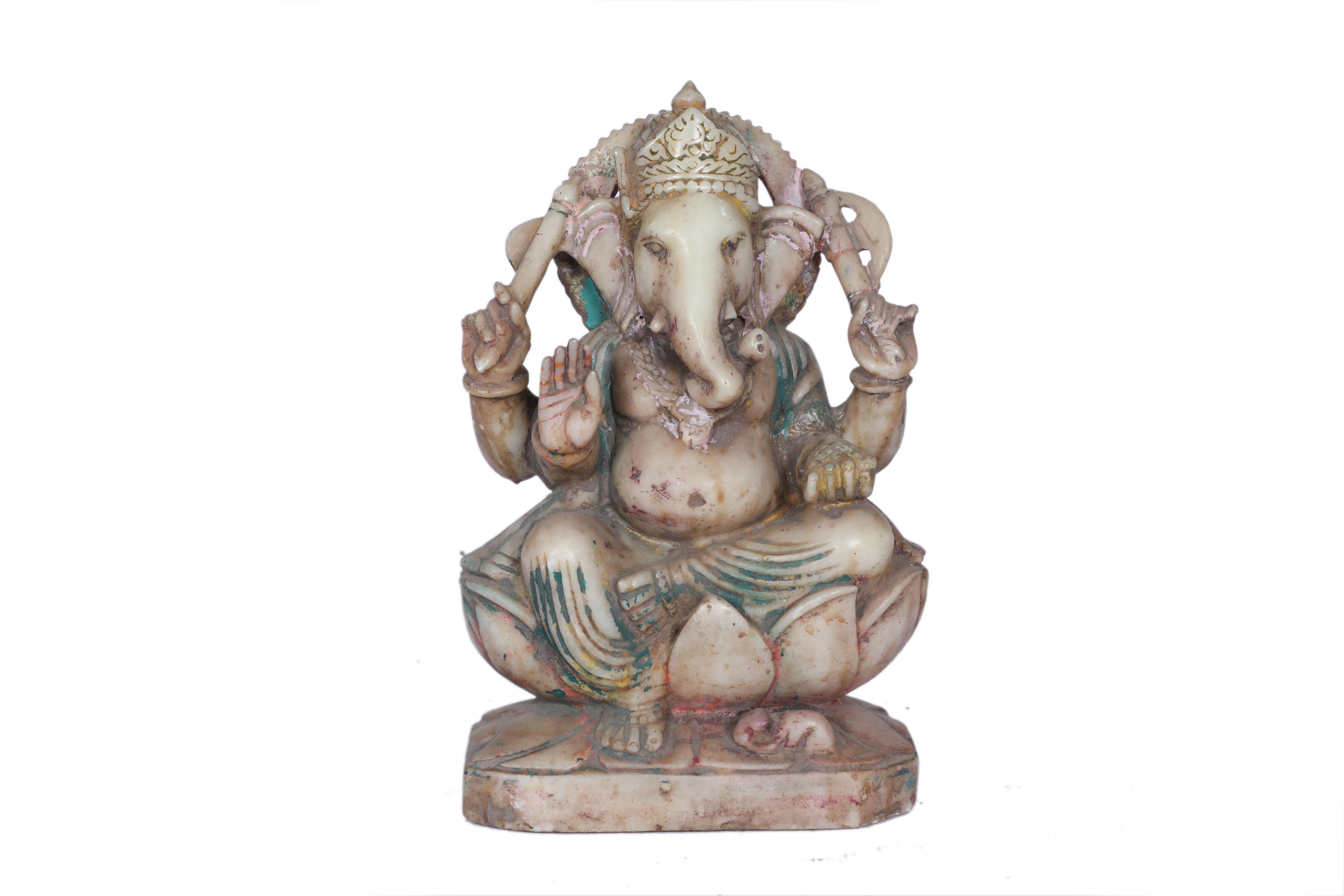 A wonderful example of Ganesh, Hinduism's most popular and revered deity.  The remover of obstacles, Ganesh is the God of wisdom, success and good luck.  This carved marble sculpture depicts all the expected symbolism--the axe to cut away ignorance,