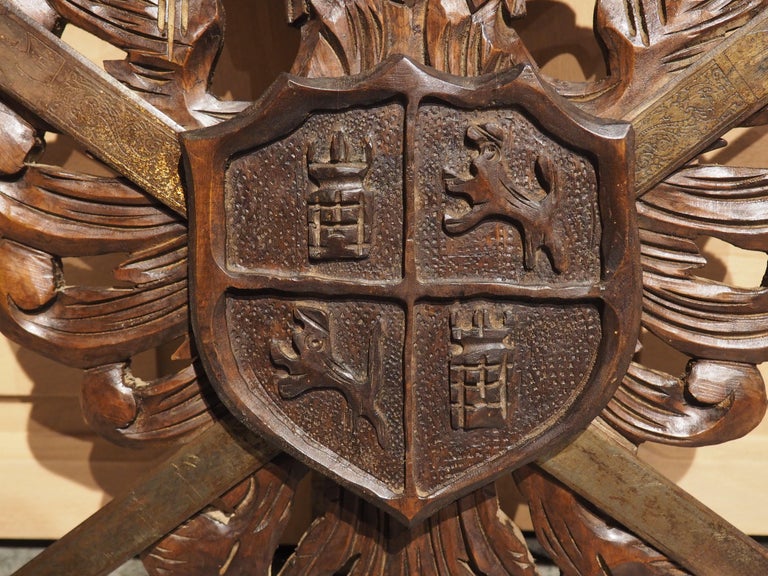 Early 1900s Carved Wooden Coat of Arms Plaque with Crossed Swords For