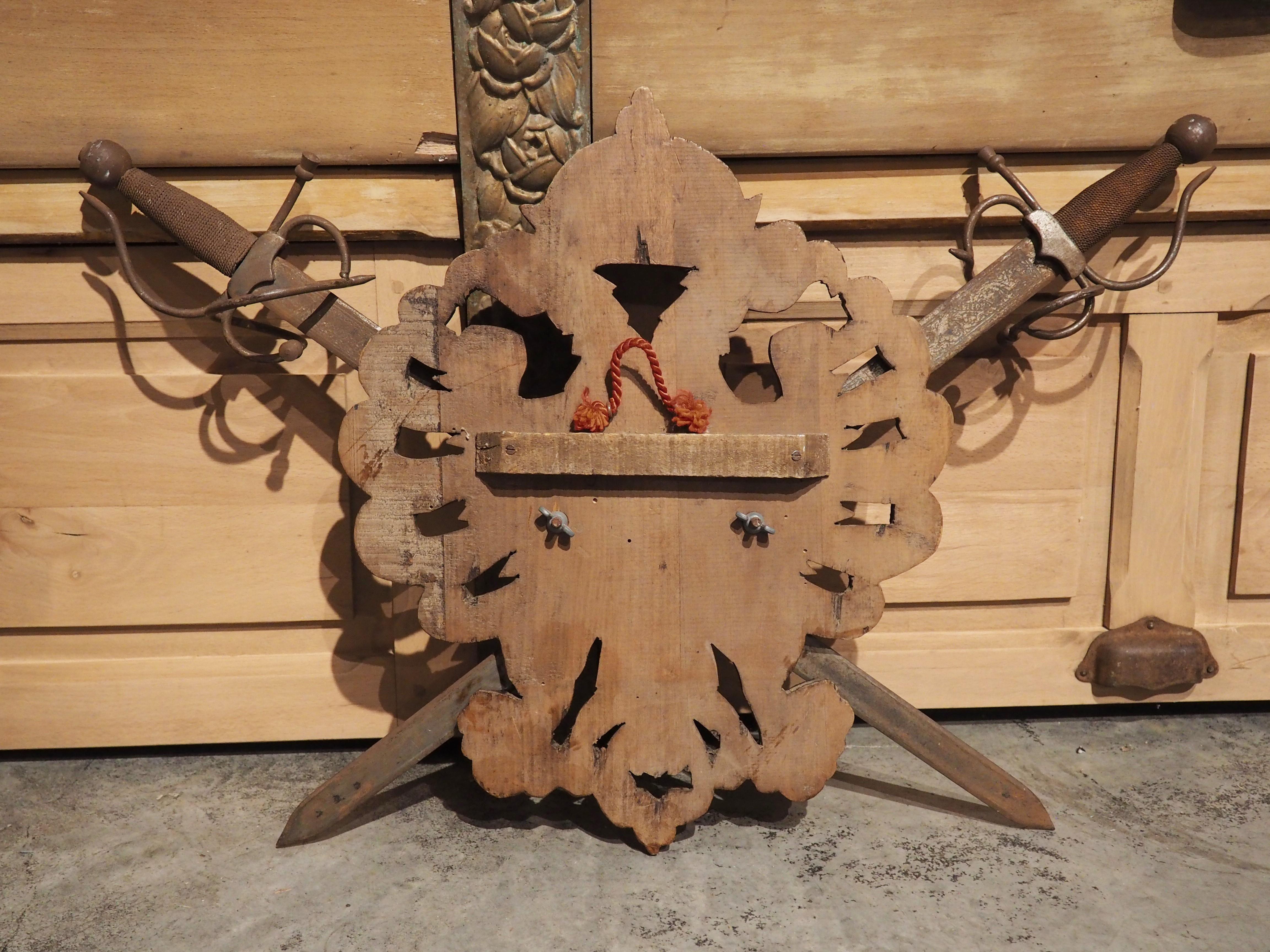 Early 1900s Carved Wooden Coat of Arms Plaque with Crossed Swords 6
