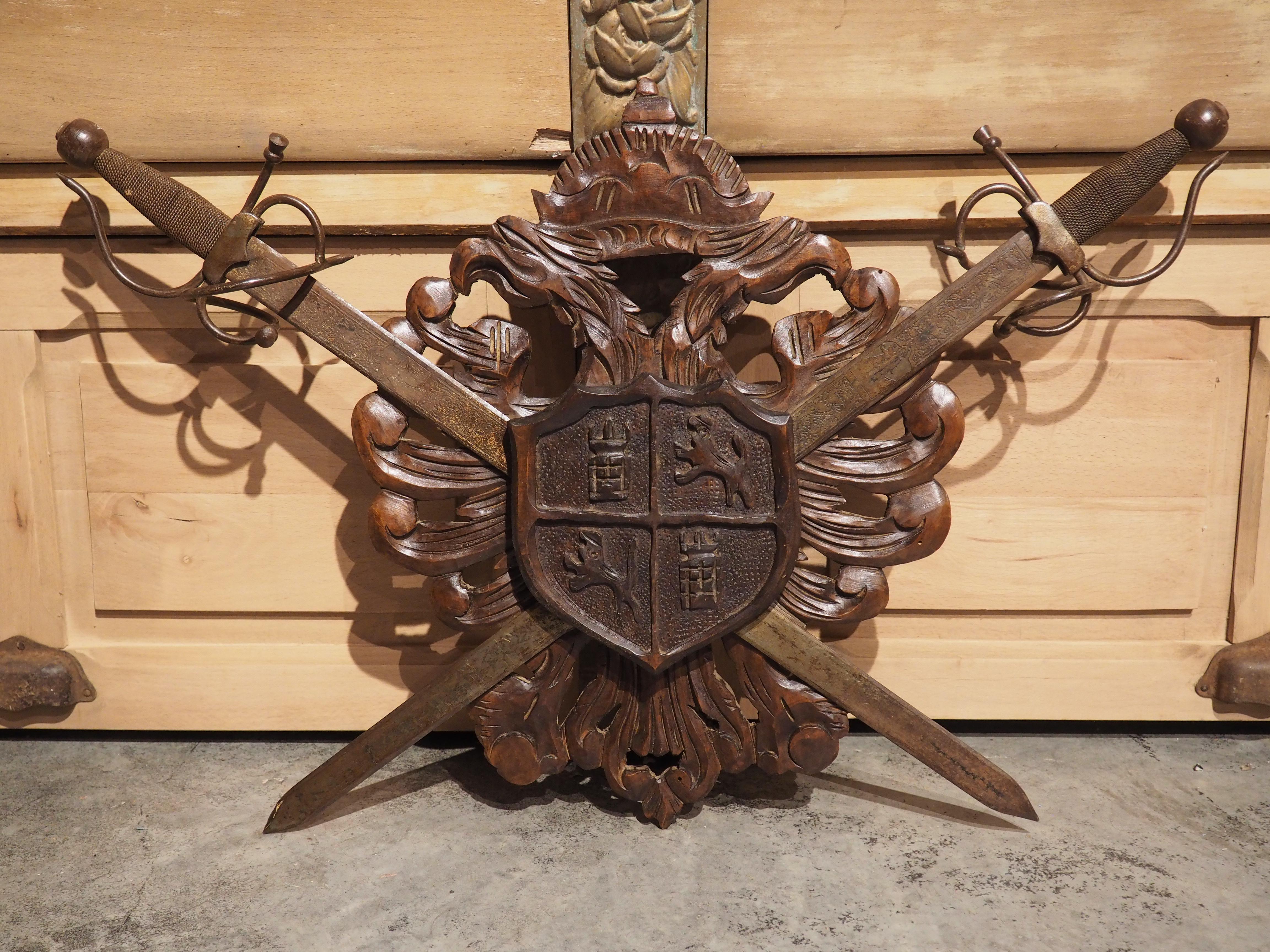 Early 1900s Carved Wooden Coat of Arms Plaque with Crossed Swords 7