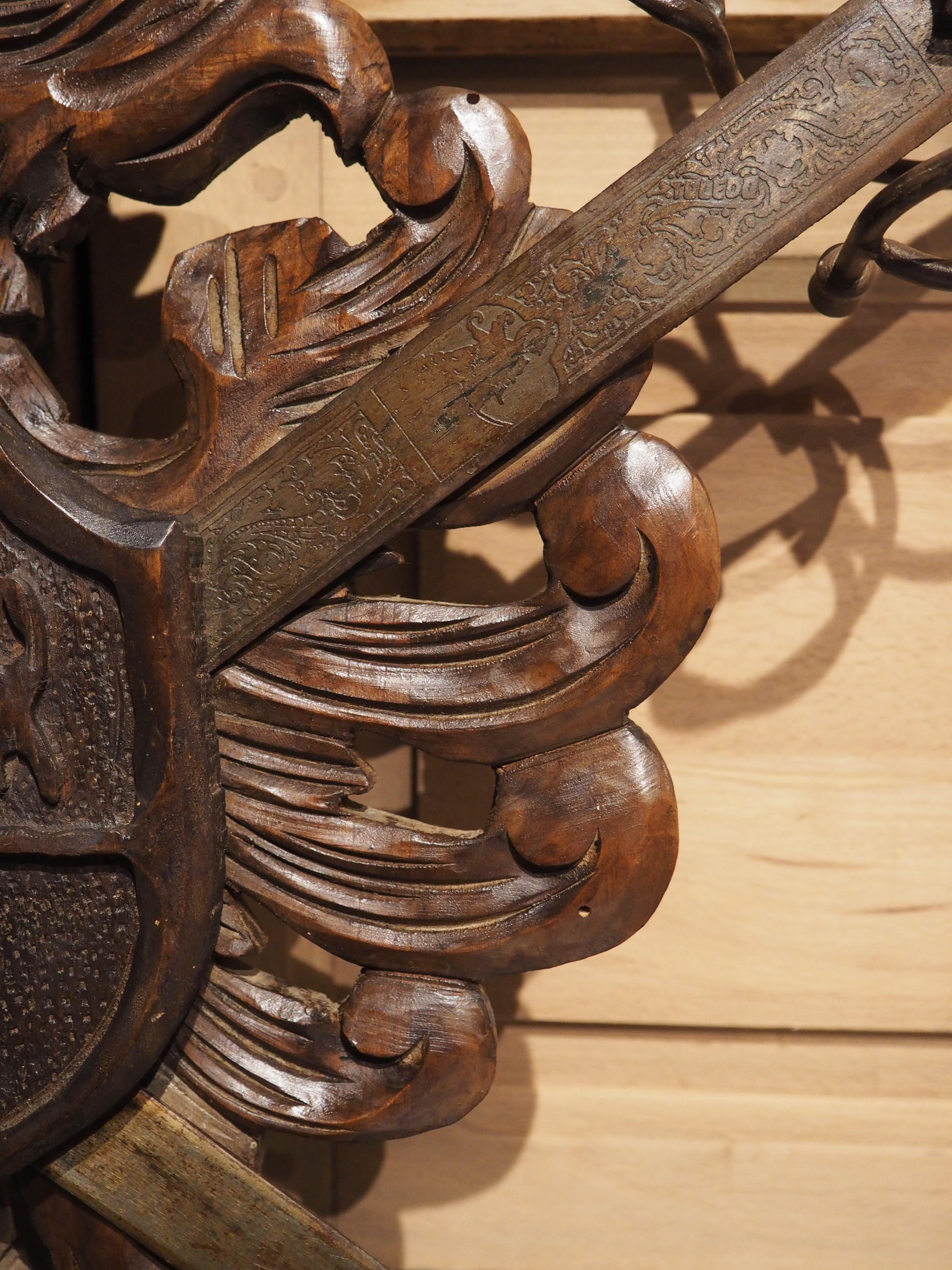 Metal Early 1900s Carved Wooden Coat of Arms Plaque with Crossed Swords