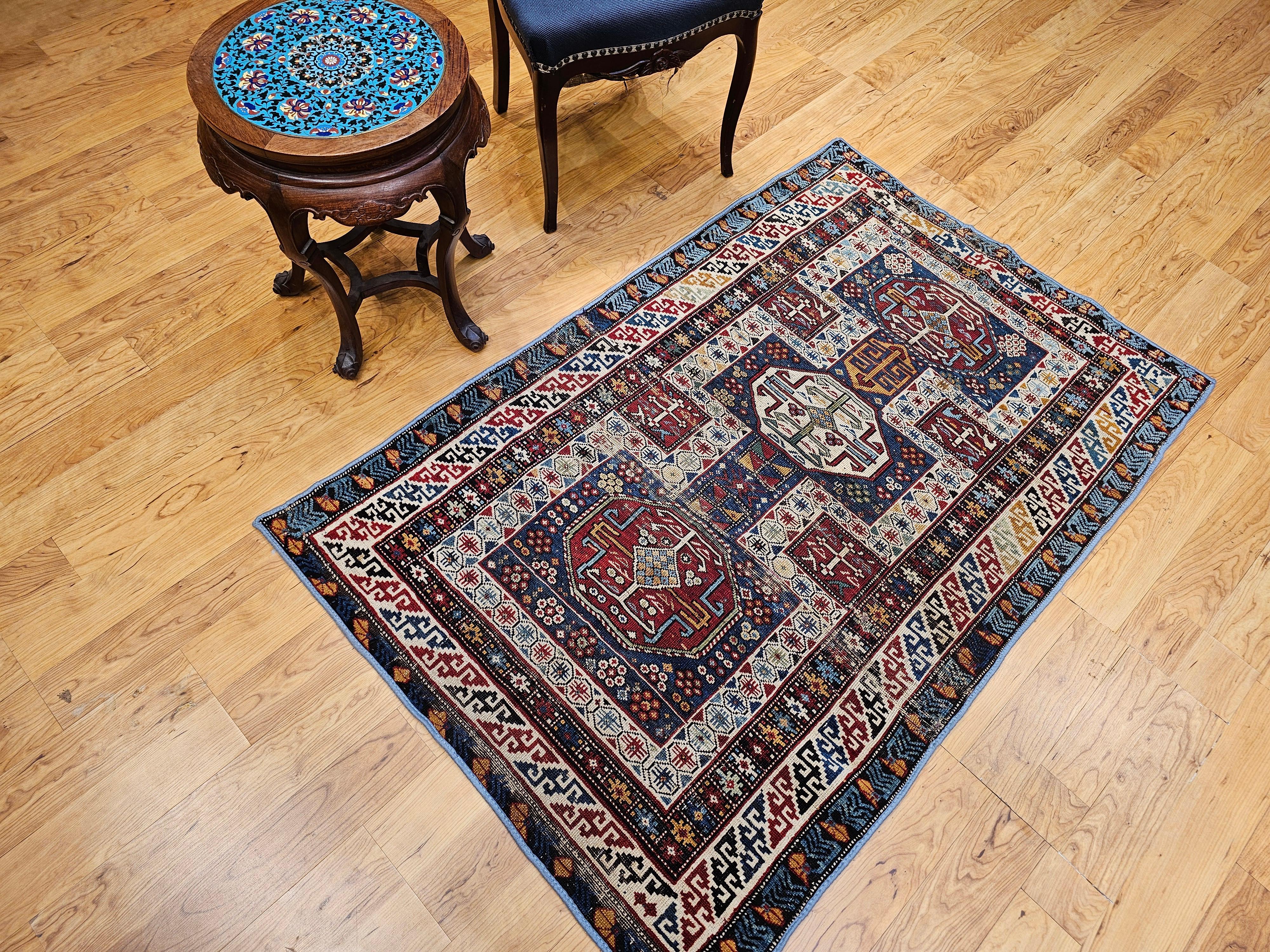 Early 1900s Caucasian Kuba Area Rug in French Blue, Red, Ivory, Yellow For Sale 4