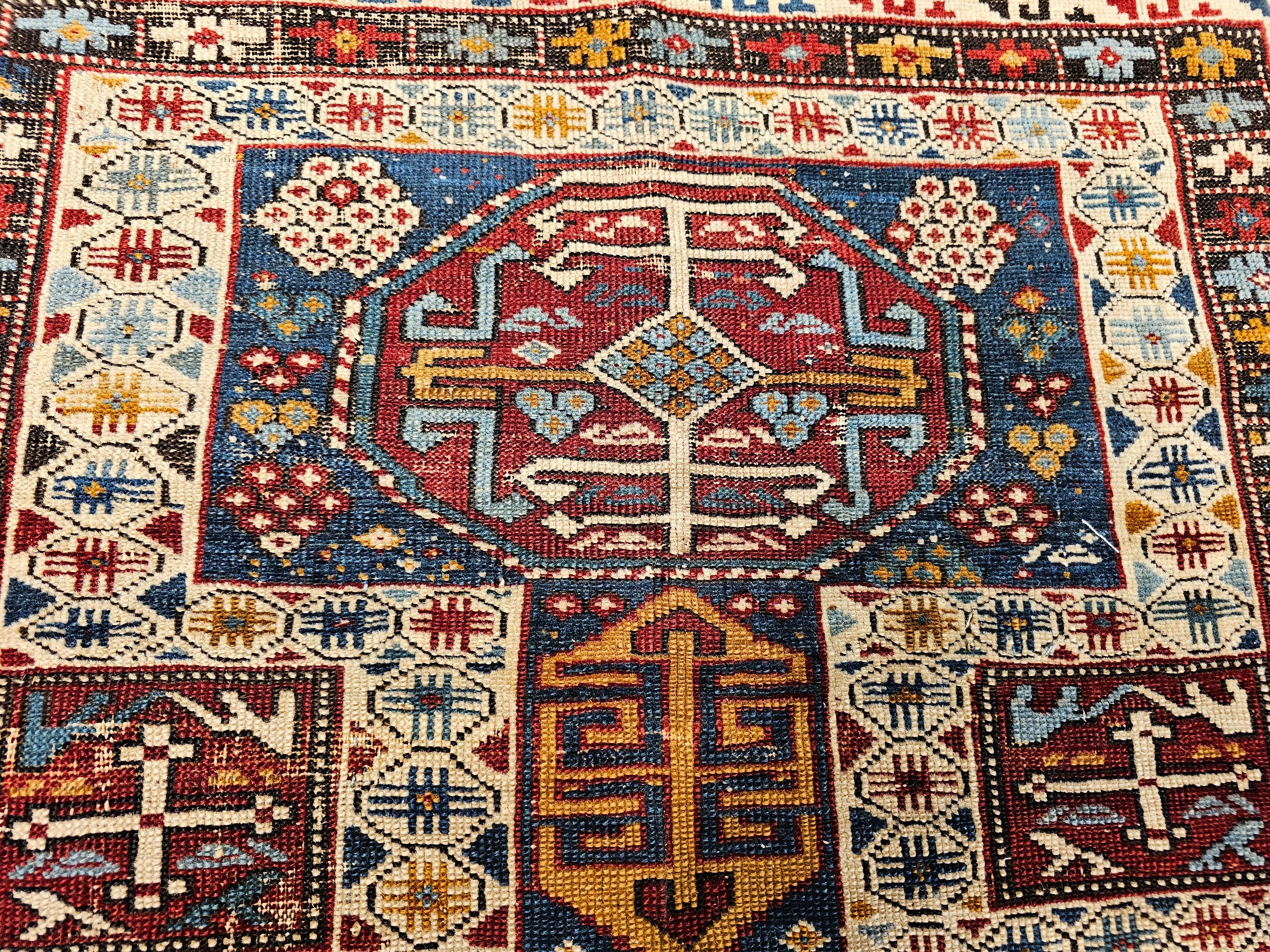 Azerbaijani Early 1900s Caucasian Kuba Area Rug in French Blue, Red, Ivory, Yellow For Sale