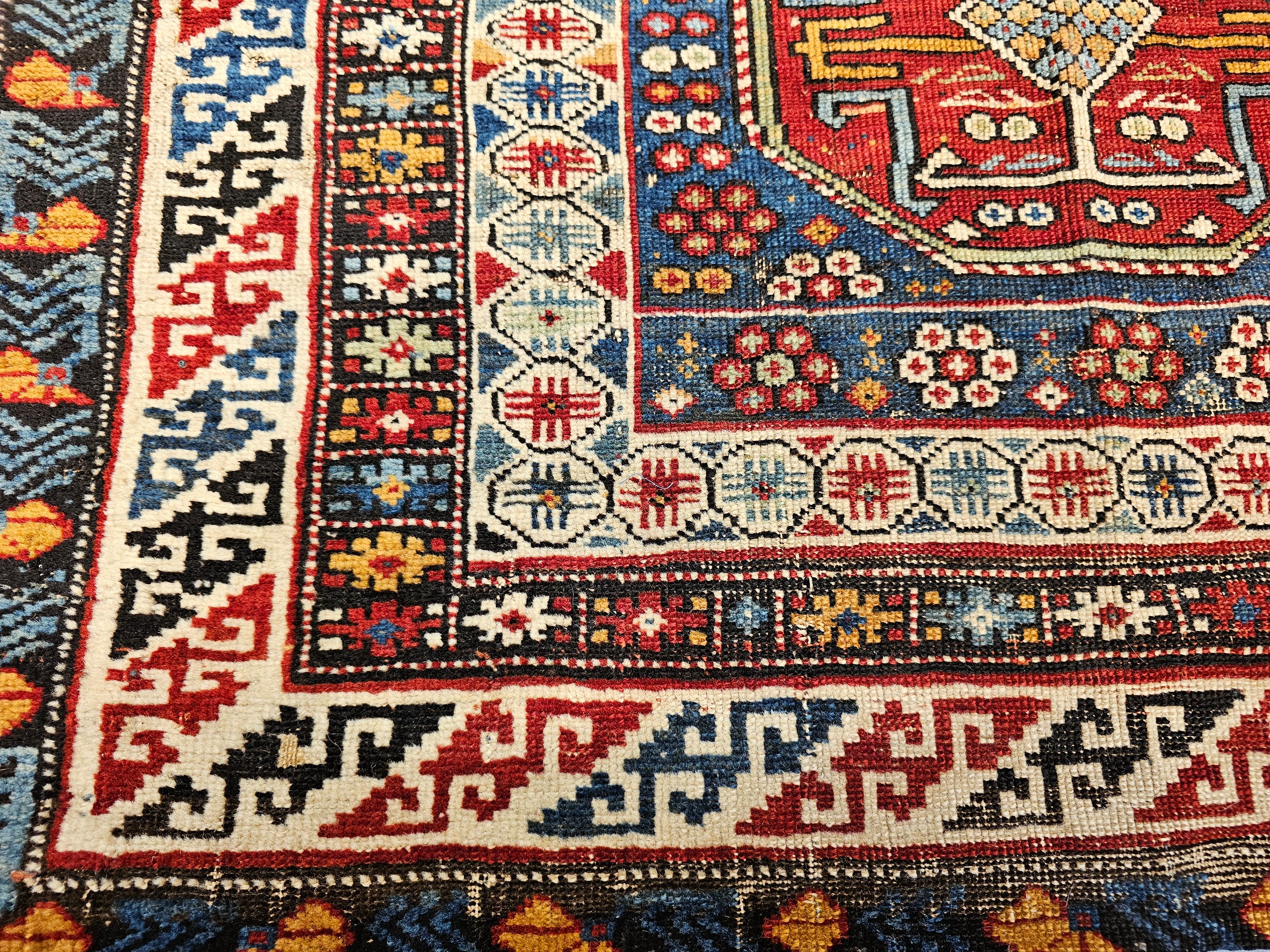 Early 20th Century Early 1900s Caucasian Kuba Area Rug in French Blue, Red, Ivory, Yellow For Sale