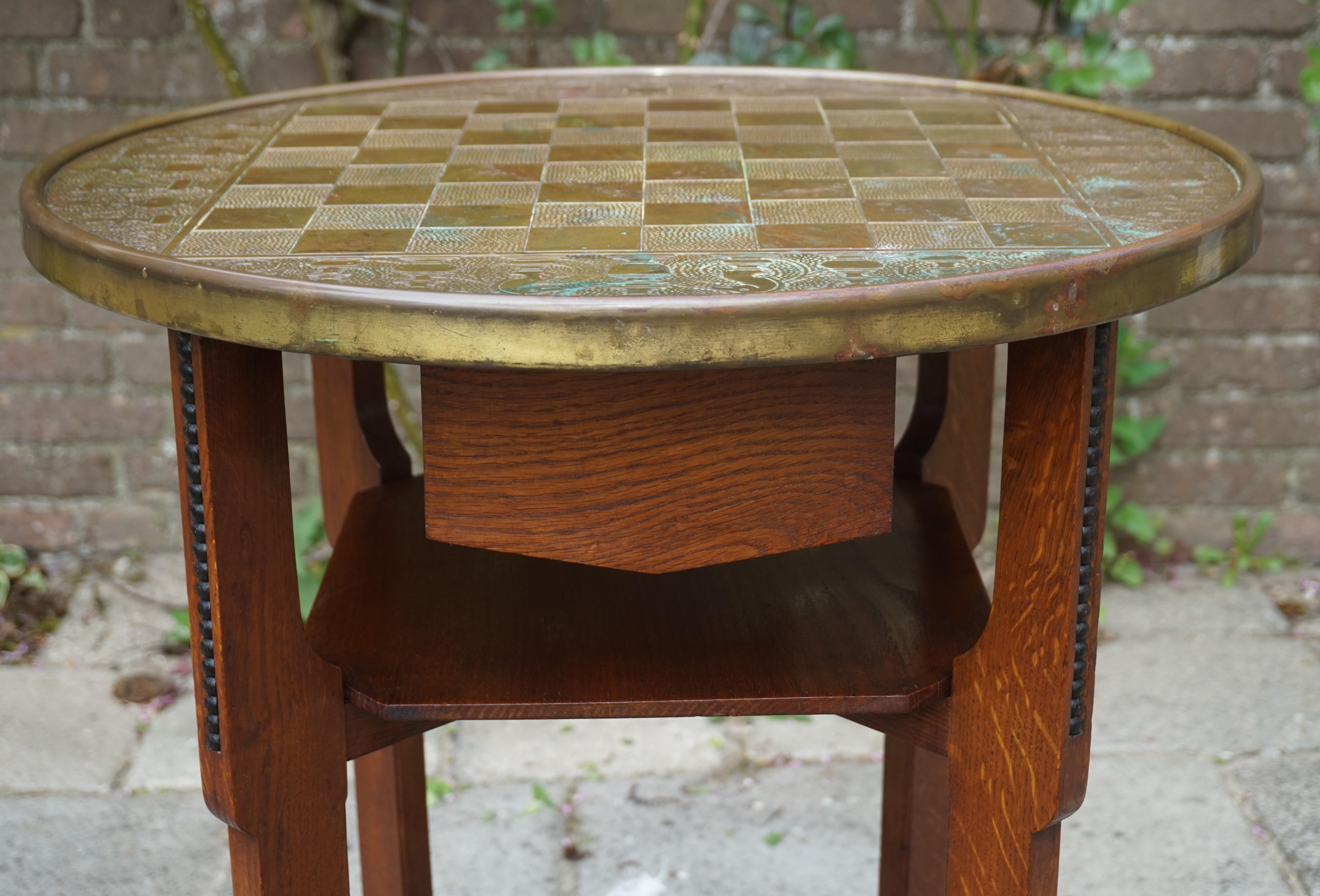 Antique arts and crafts chess table.

We have sold a few antique chess tables before, but never one from the Dutch Arts and Crafts era and never one as stylish and decorative as this one. The combination of the beautifully designed, tiger oak base