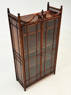 Early 1900’s Faux Bamboo Stick and Ball Display Cabinet
