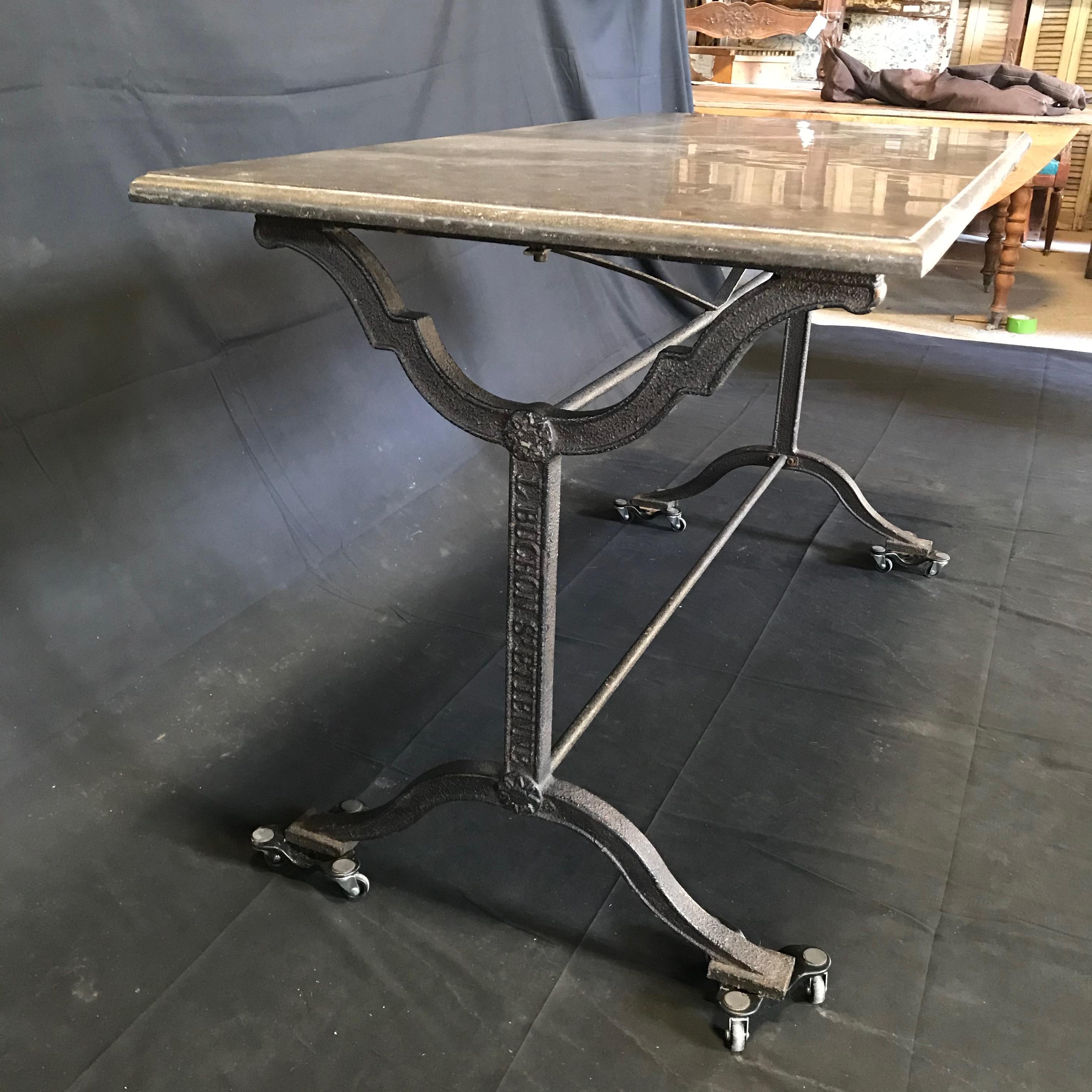 Early 1900s French Bistro or Cafe Table with Stone Top and Wrought Iron Base In Excellent Condition In Hopewell, NJ