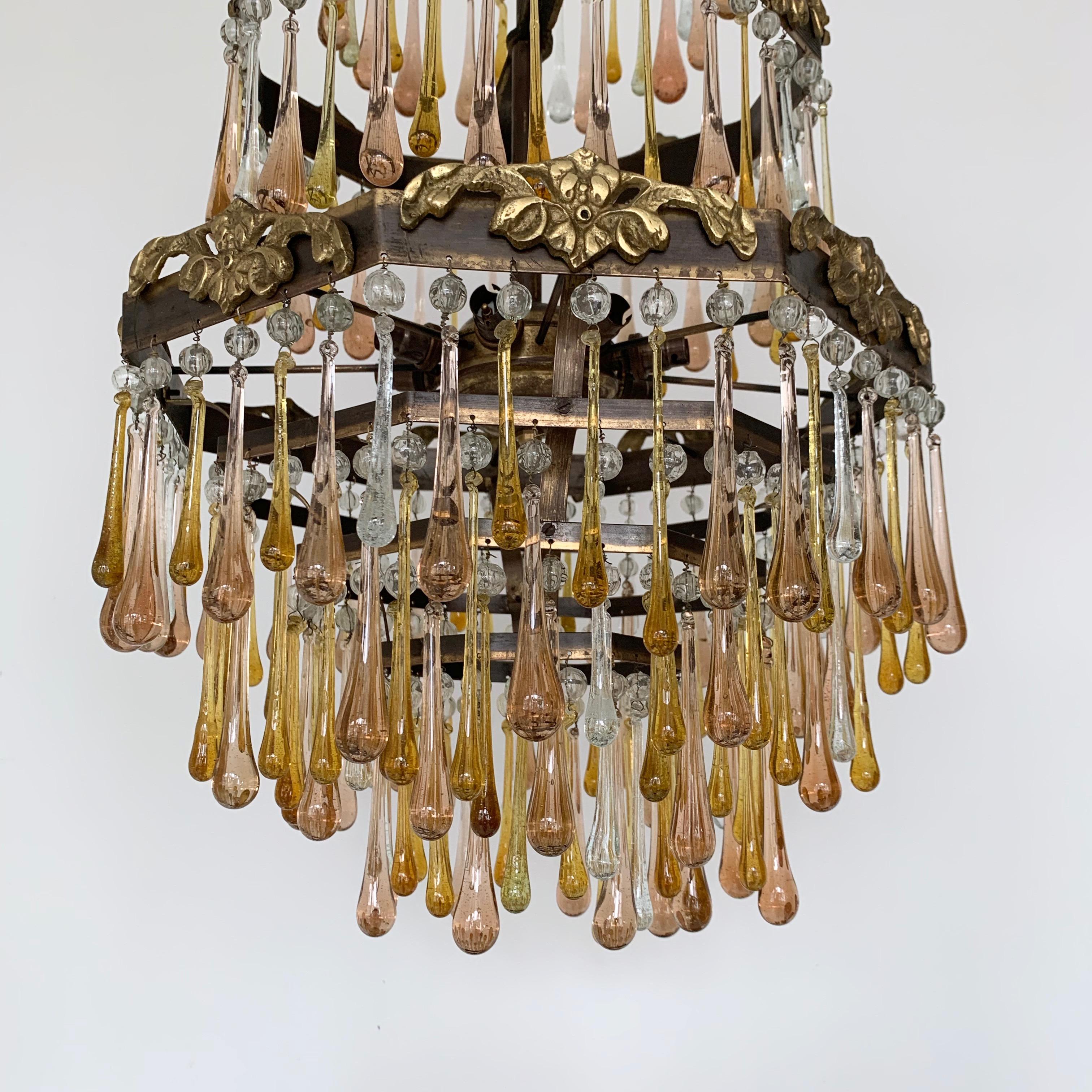 Early 1900s French Brass Waterfall Chandelier Frame Dressed in Peach and Amber For Sale 2