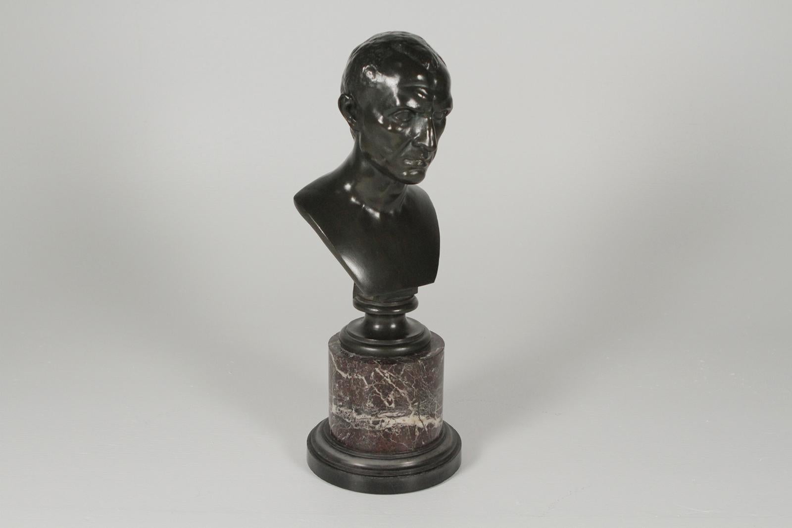 Early 1900s French bronze bust on a marble base. Great original dark patination with neoclassic style marble base. Measures: 17 inches tall.  Wonderful well cared for condition and a very scholarly look... 