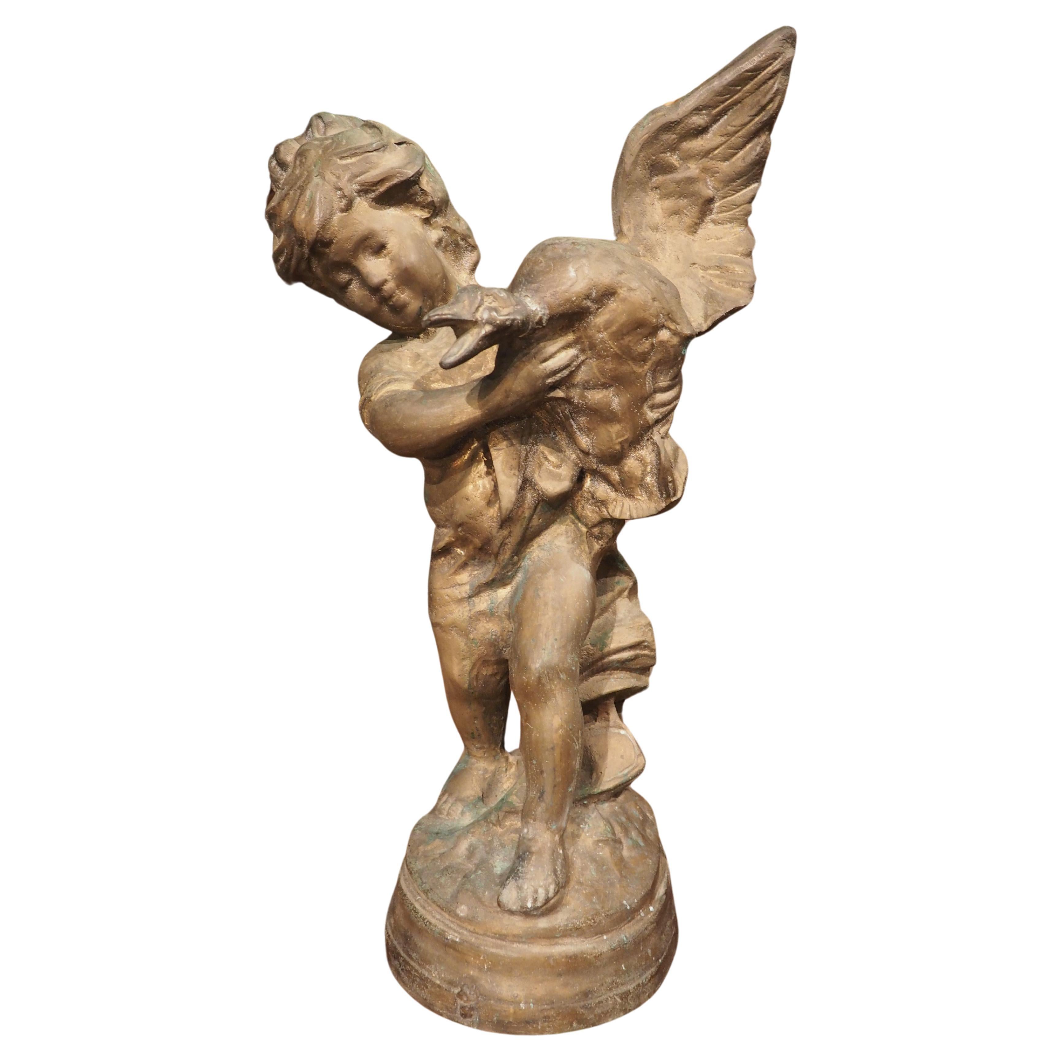 Early 1900s French Bronze Statue of Boy and Duck For Sale