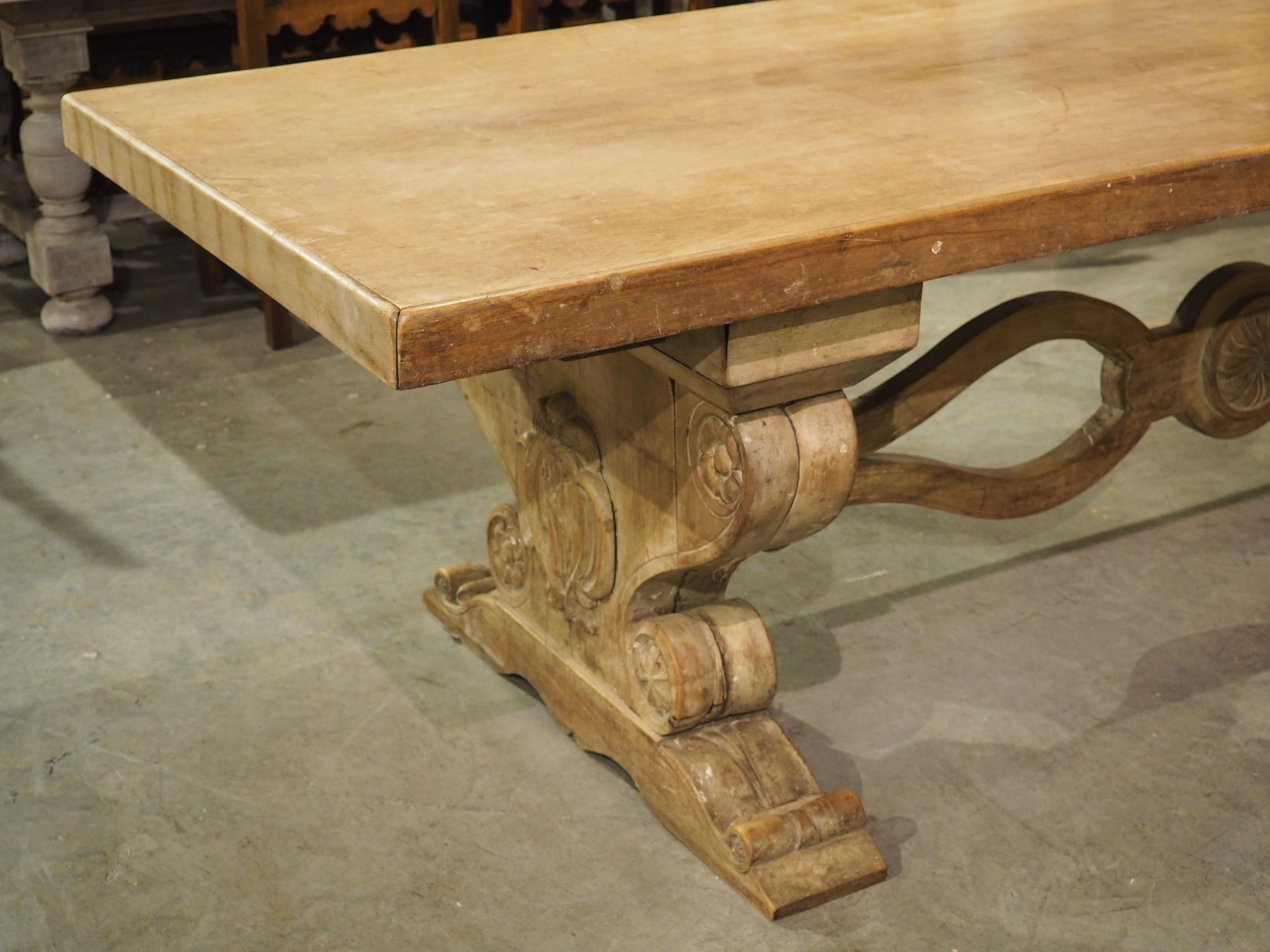 20th Century Early 1900’s French Dining Table with Shaped Trestle Supports and Cartouche Carv For Sale