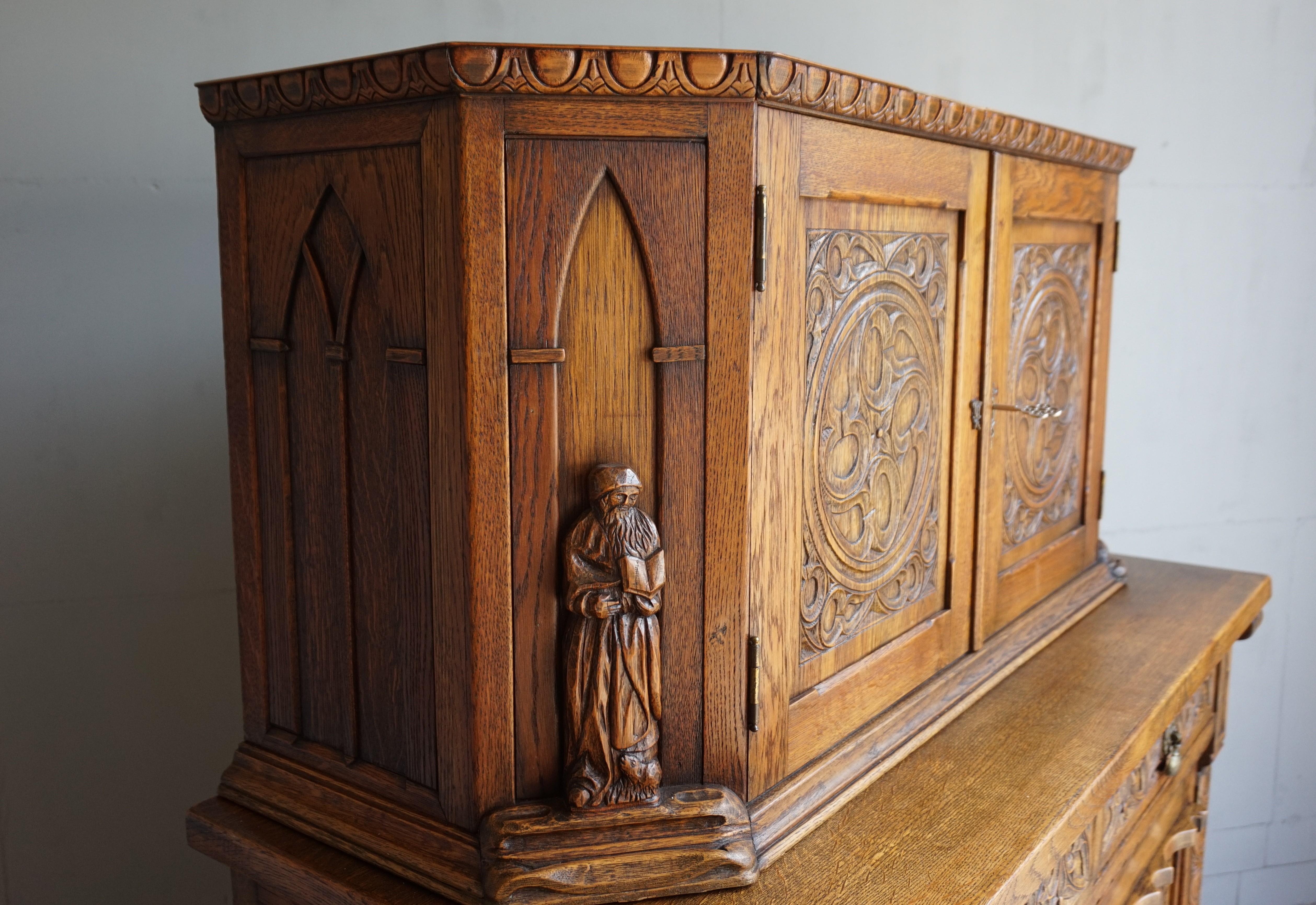 Early 1900s Gothic Revival, Hand Carved Two Piece Oak Cabinet w. Monk Sculptures 7