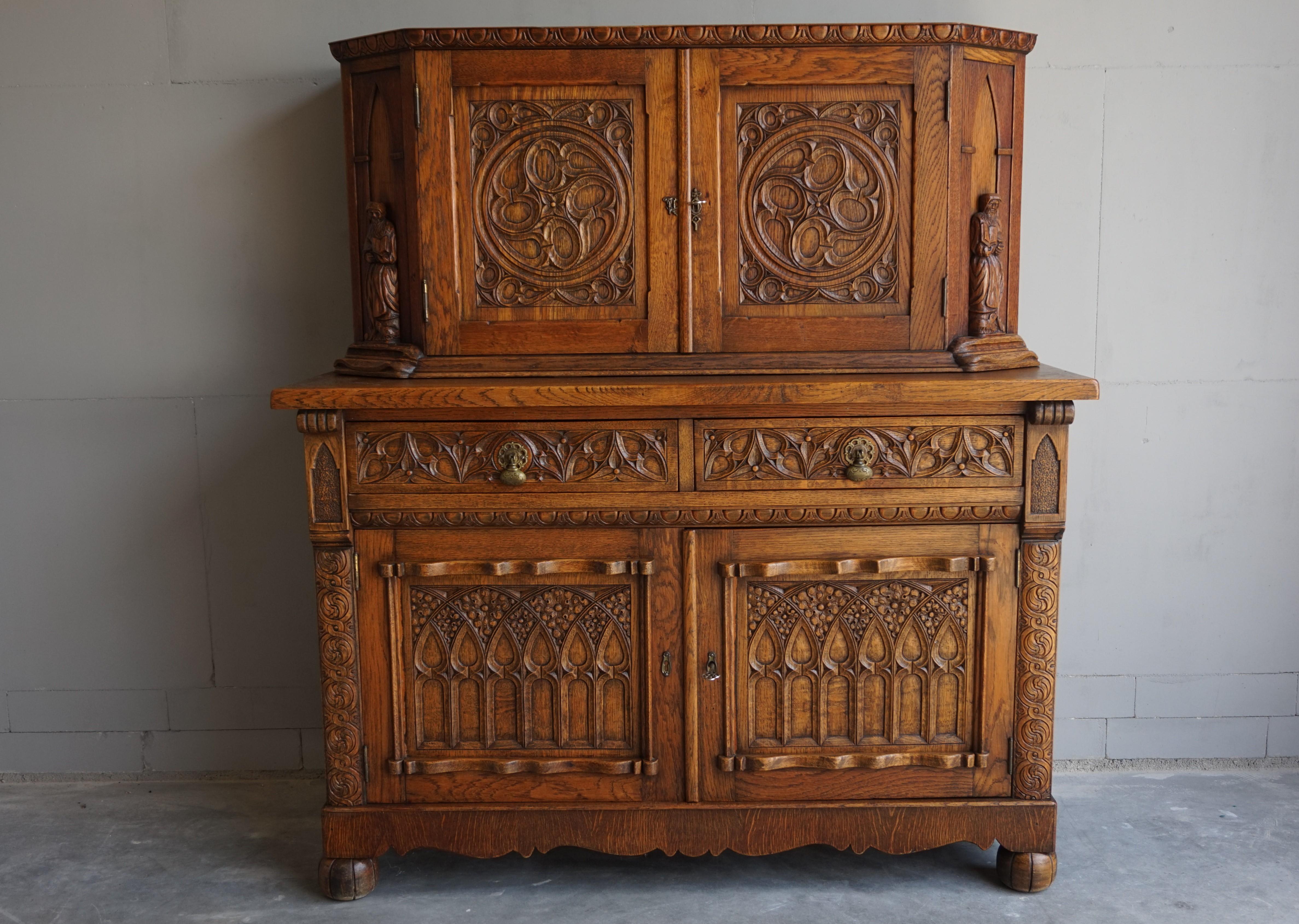 Hand-Carved Early 1900s Gothic Revival, Hand Carved Two Piece Oak Cabinet w. Monk Sculptures