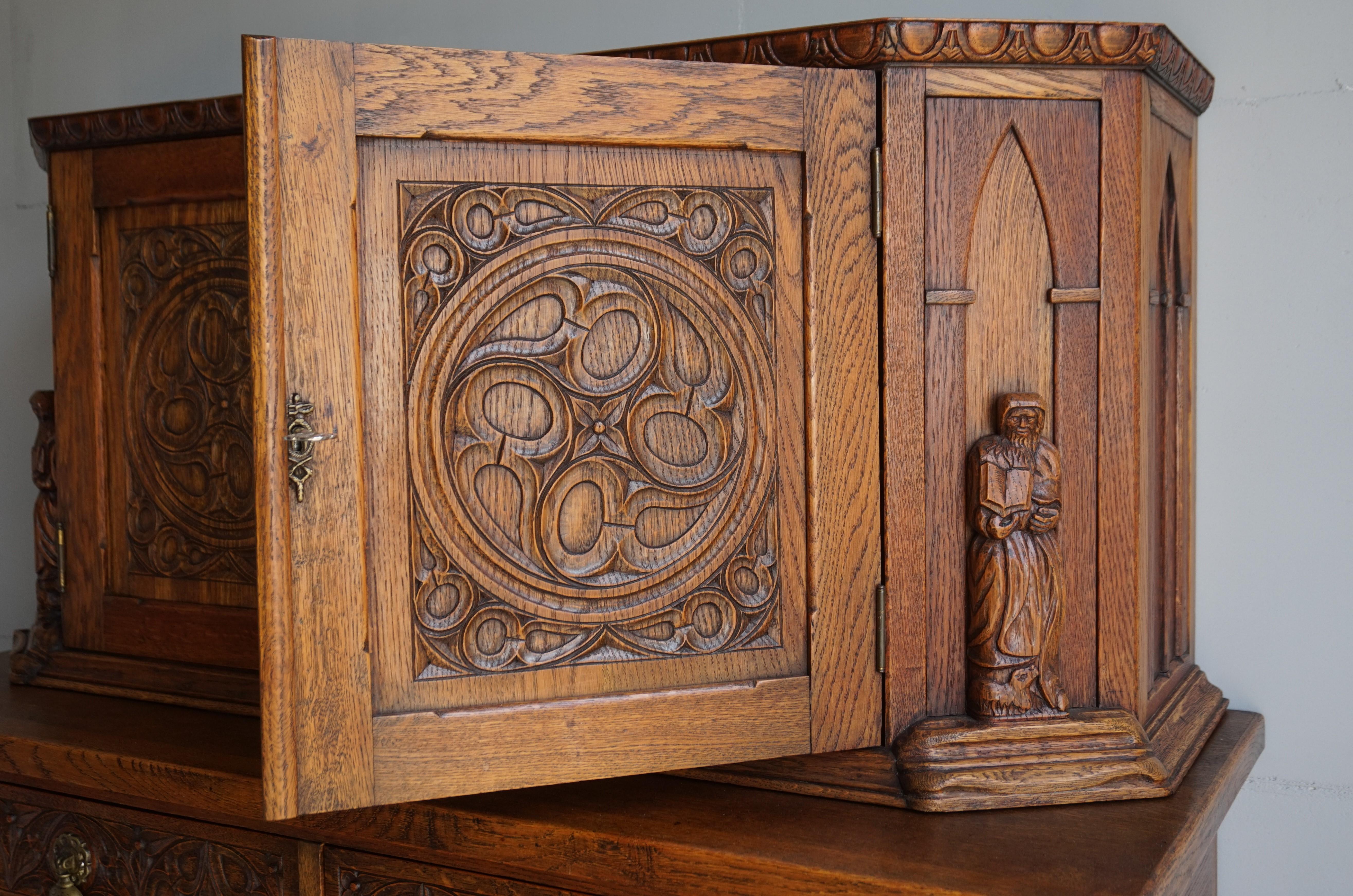 20th Century Early 1900s Gothic Revival, Hand Carved Two Piece Oak Cabinet w. Monk Sculptures