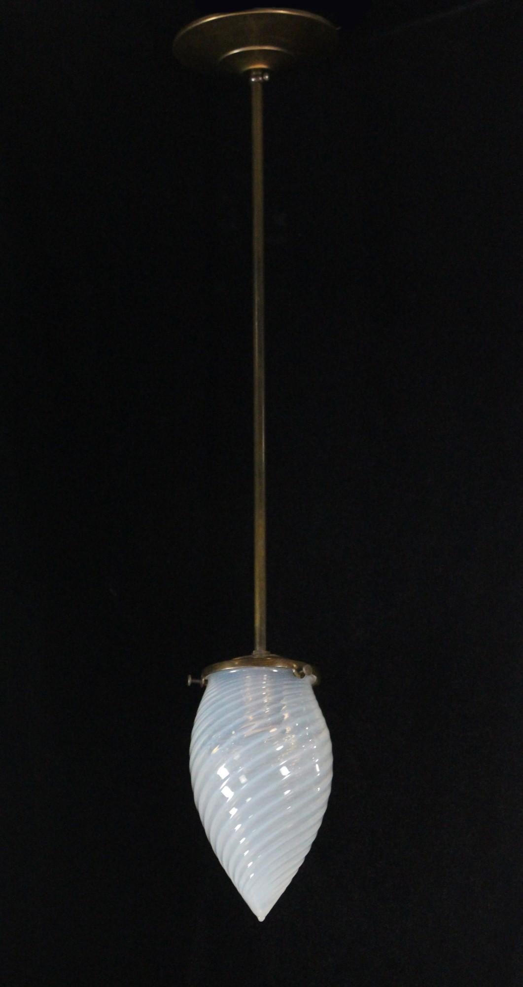 Antique petite hand blown opalescent glass pendant globe fitted with new brass pole and fitter. It has a teardrop shape with white swirls. Cleaned and rewired. Please note, this item is located in our Scranton, PA location.