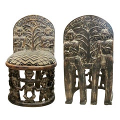 Early 1900s Hand-Carved African Tribal Chairs with Intricate Figurative Detailin