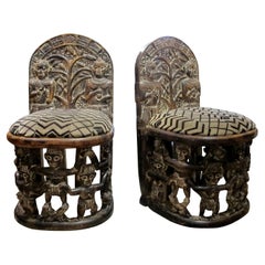 Early 1900s Hand-Carved African Tribal Chairs with Intricate Figurative Detailin