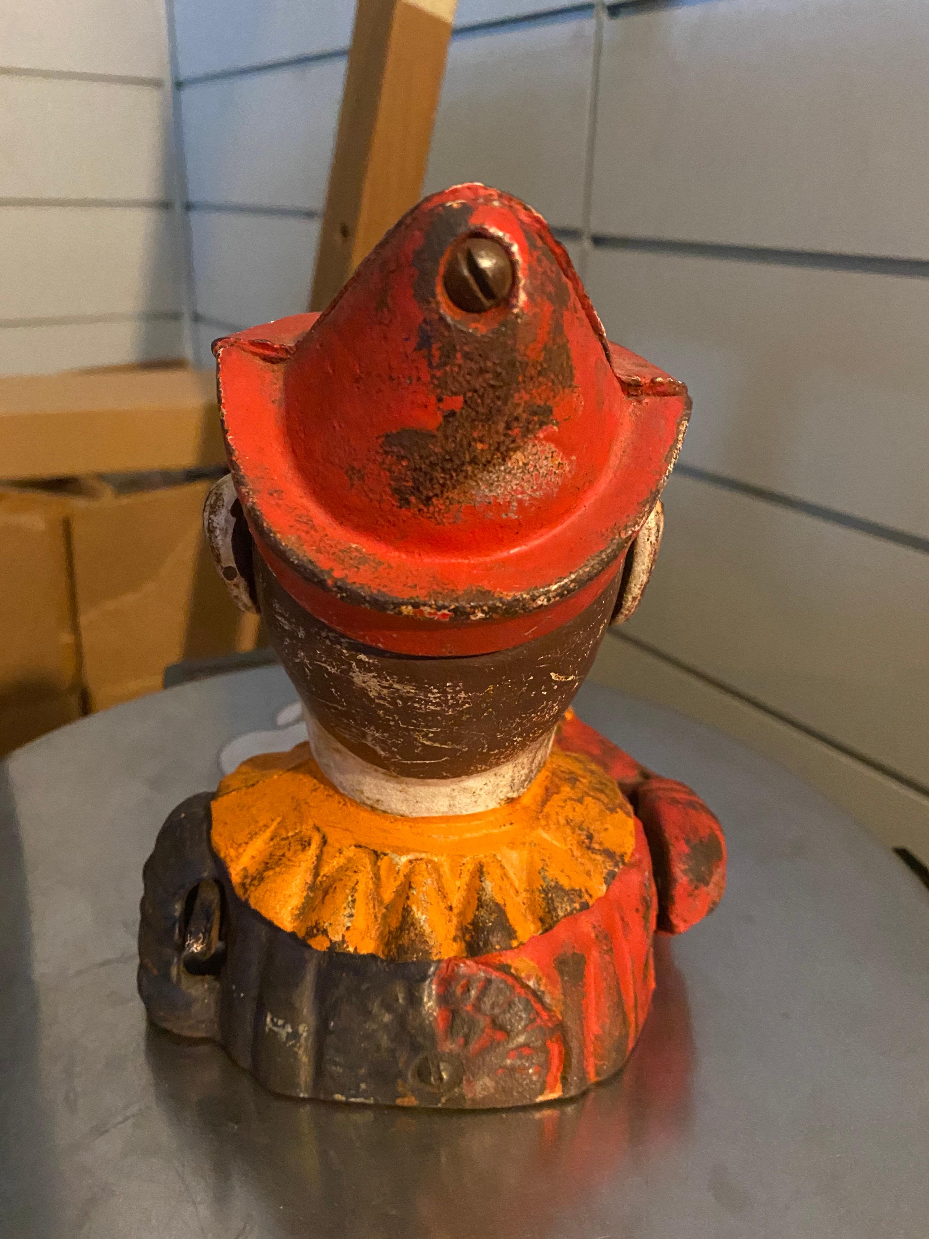 Rustic Early 1900s Humpty Dumpty Circus Clown Cast Iron Mechanical Bank For Sale