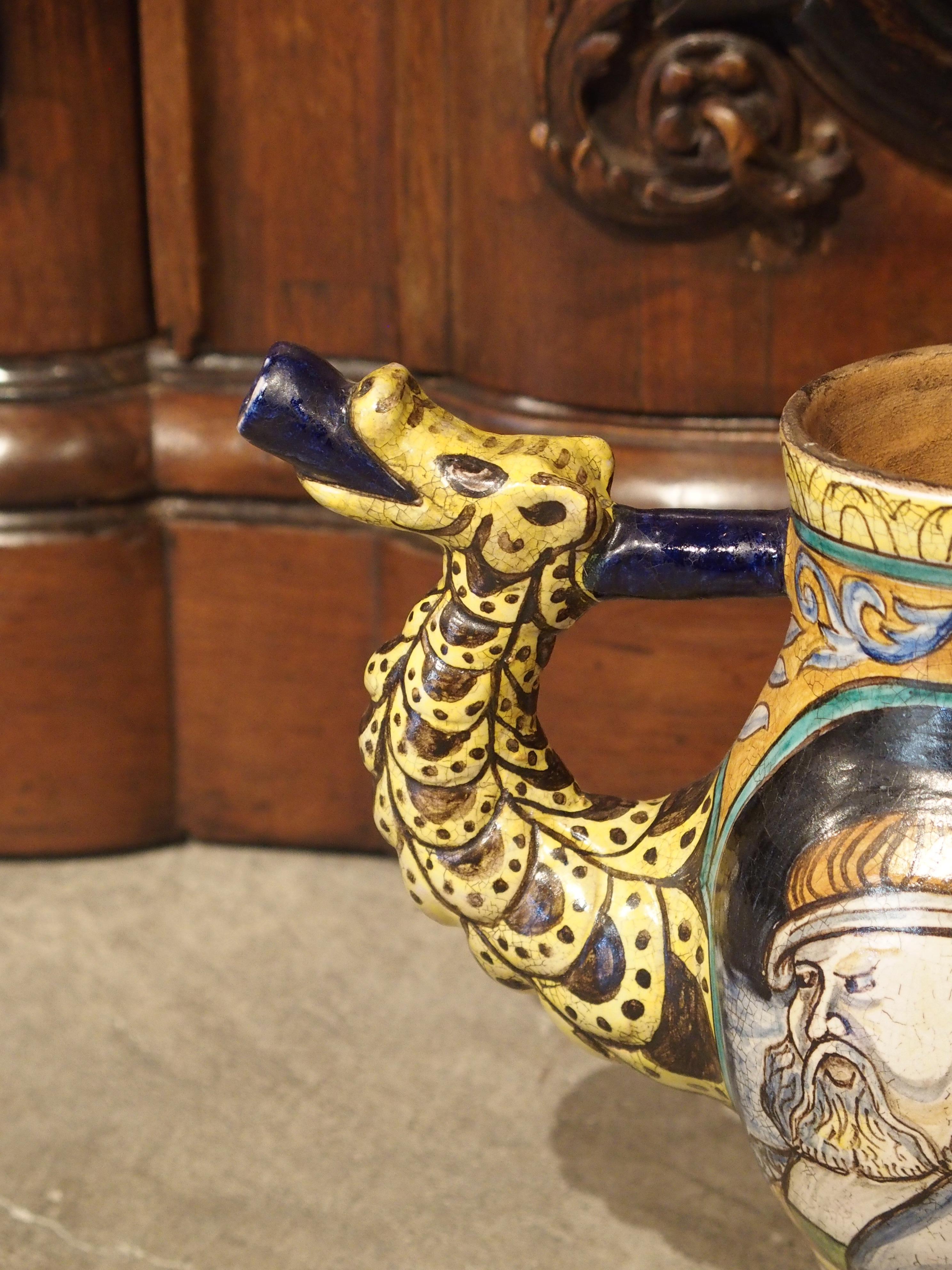 From Italy, this majolica apothecary pitcher (orciuolo) is in the manner of the pitcher done by Castelli, circa 1520, housed in the MET Museum NYC, The Robert Lehman collection, 1975.

The hand painted pitcher below dates to the early 1900s, and