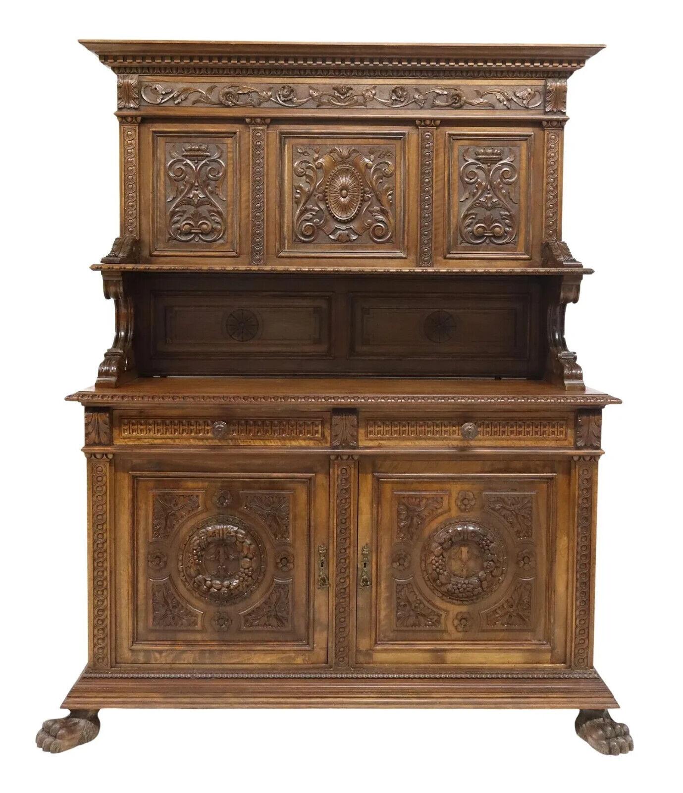 Gorgeous Antique Sideboard, Italian Renaissance Revival, Carved Walnut, Early 1900s, 20th Century!

This stunning antique sideboard is a true masterpiece of Italian Renaissance Revival style. Crafted from intricately carved walnut, this piece is