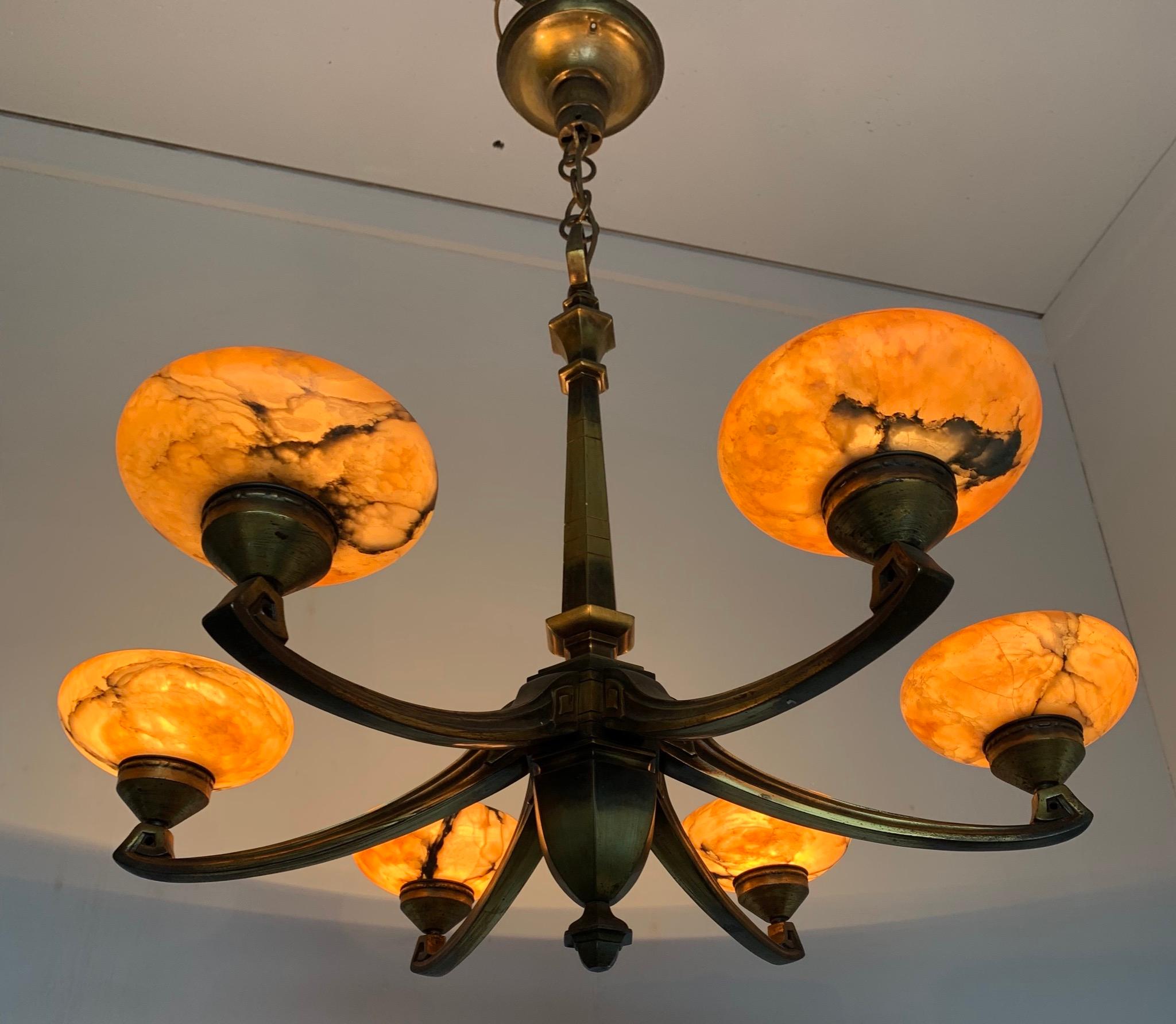 Stylish and very good quality bronze ceiling lamp.

This wonderful bronze and alabaster fixture too can be used in different rooms and various interiors. The shape of the arms really stand out and if you are looking for a pleasing to the eye,