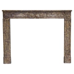 Used Waldorf Astoria Marble Mantel Louis XVI Style Regency Carved Brown Marble