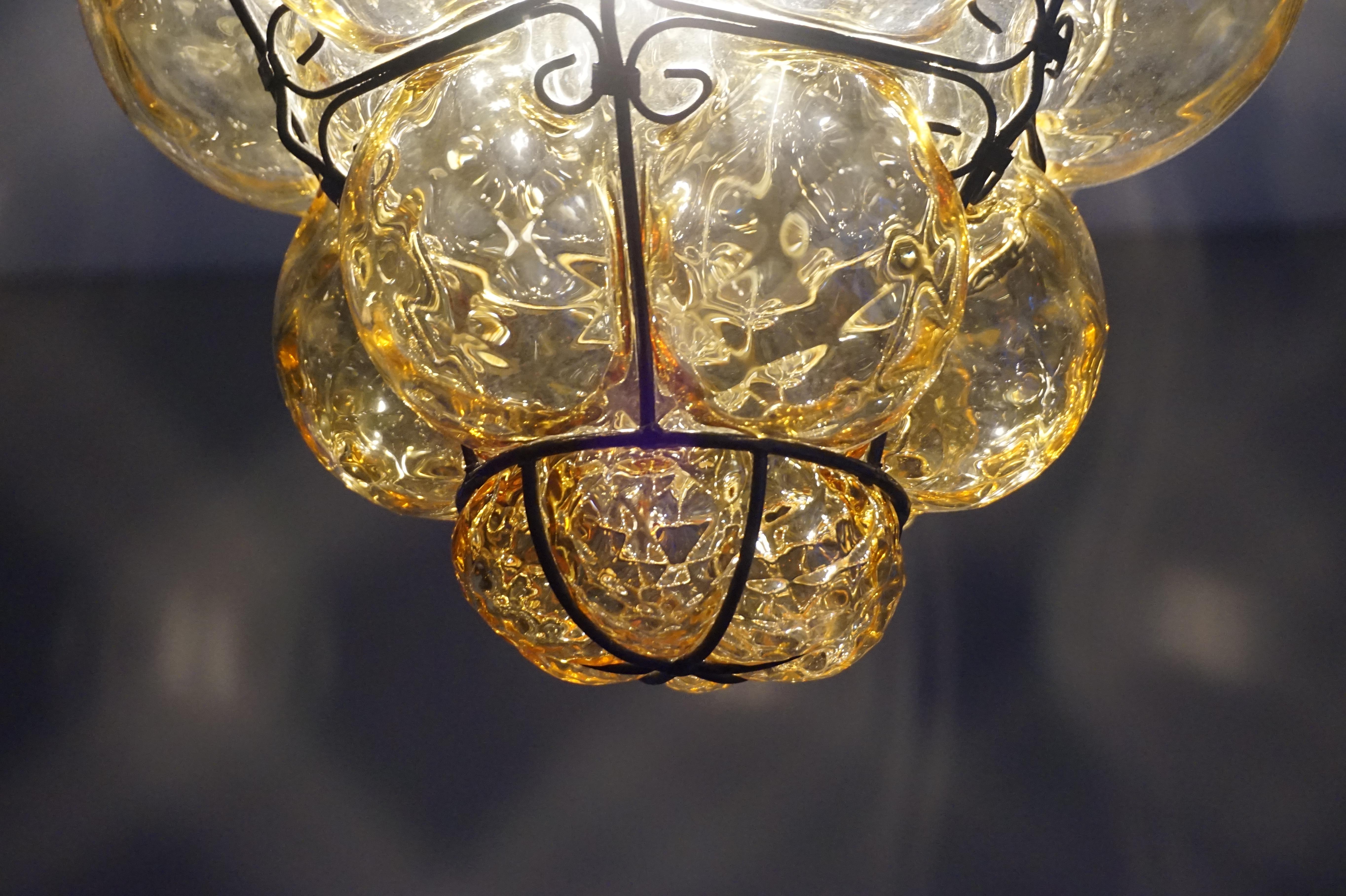 Early 1900s Mouthblown Amber Glass in Iron Frame Venetian Pendant or Chandelier In Good Condition In Lisse, NL