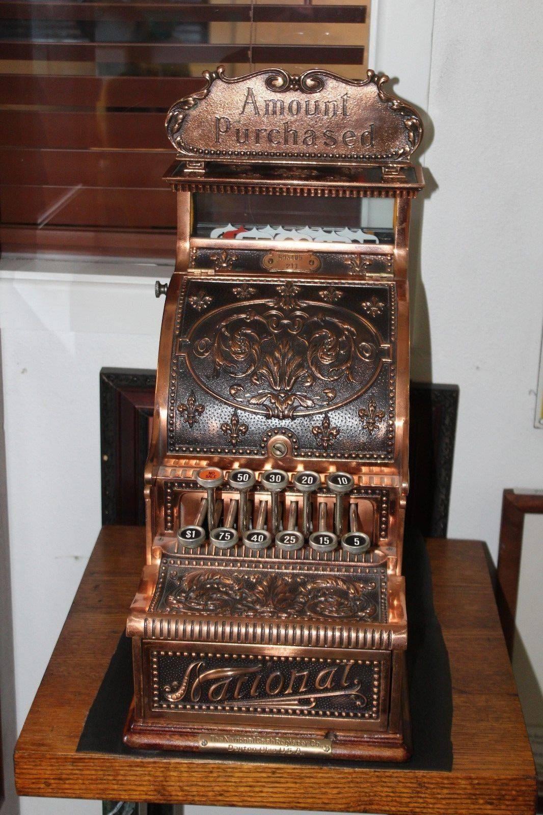 antique cash register stand