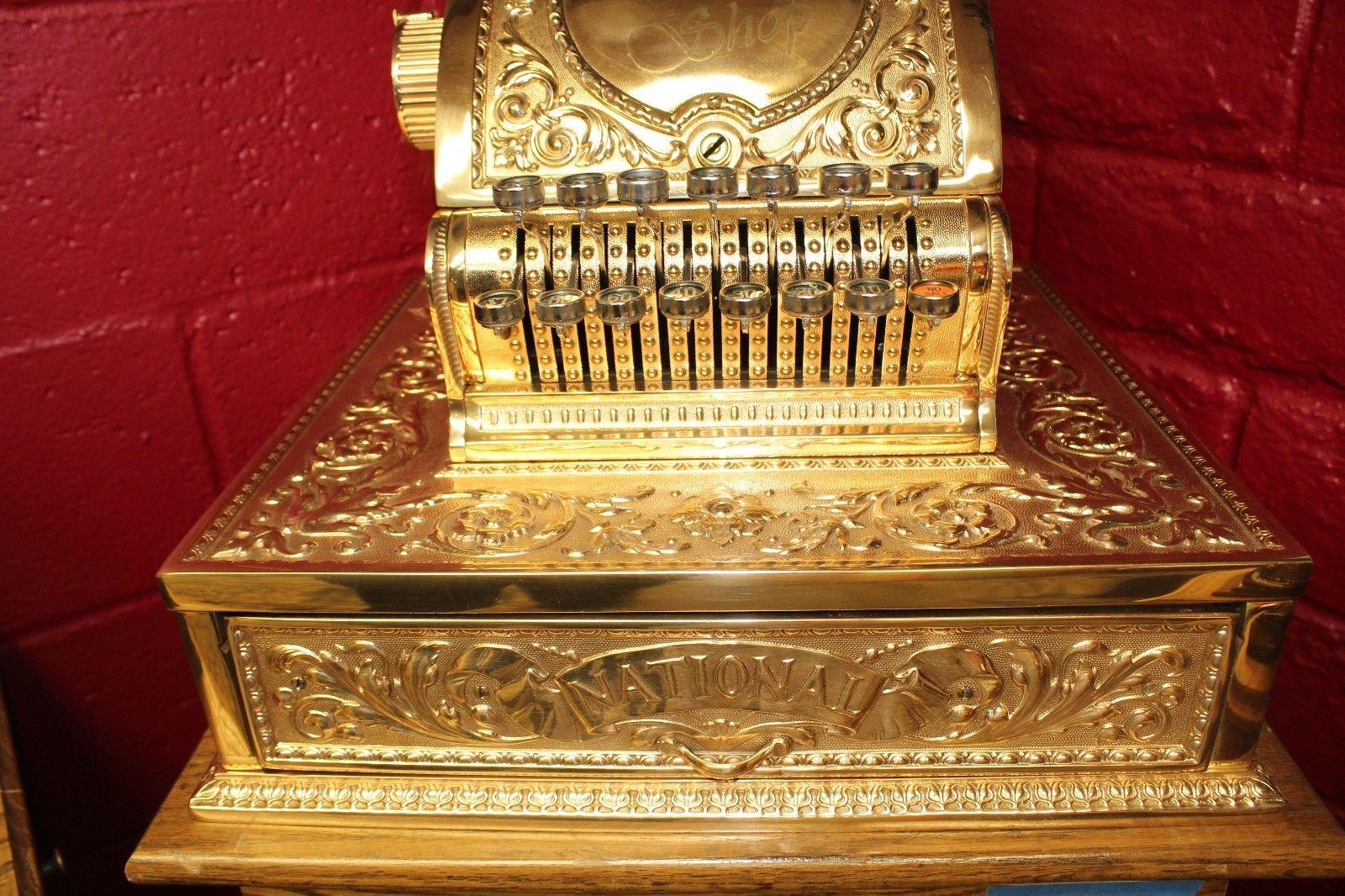 In the early 1900s, elaborate brass registers were made. Cash registers became staples in most retail stores, and to provide stronger security measures, cash registers were made with elaborate cast-metal cases from 1888-1915. 
This red brass model