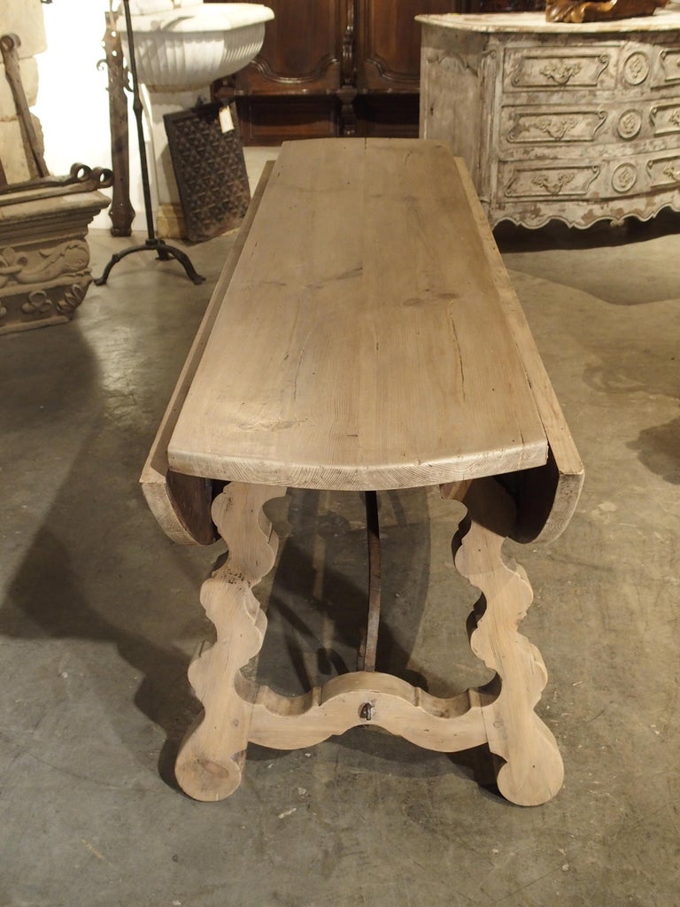 Early 1900s Oval Spanish Drop Leaf Table With Iron Hardware At 1stdibs