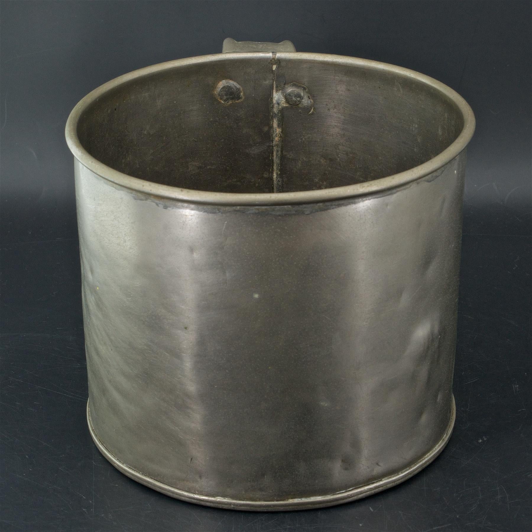 antique tin cup