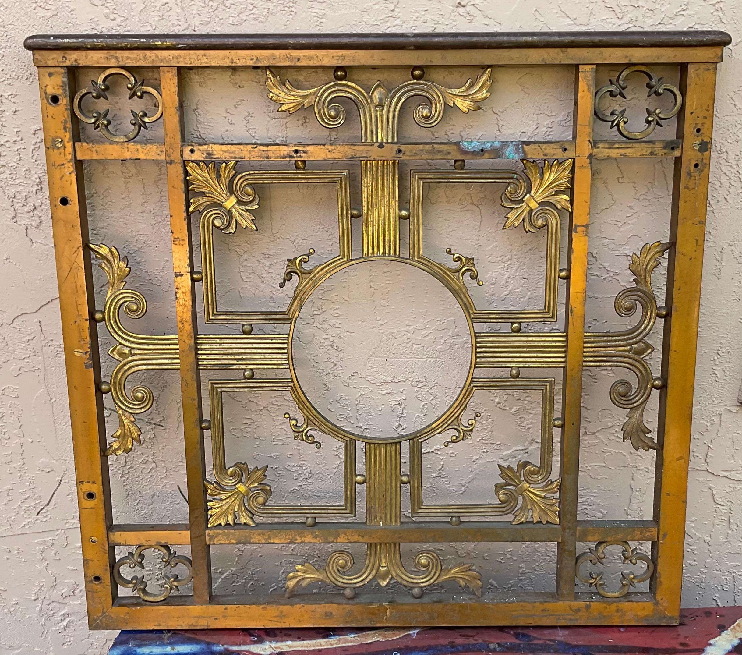 This classic early 1900's bronze pedestrian or garden gate or indoor door ,with central medallion , was salvage probably from a bank or big institution building .
exquisite and decorative motif , part of Americana salvage .
Could be converted with