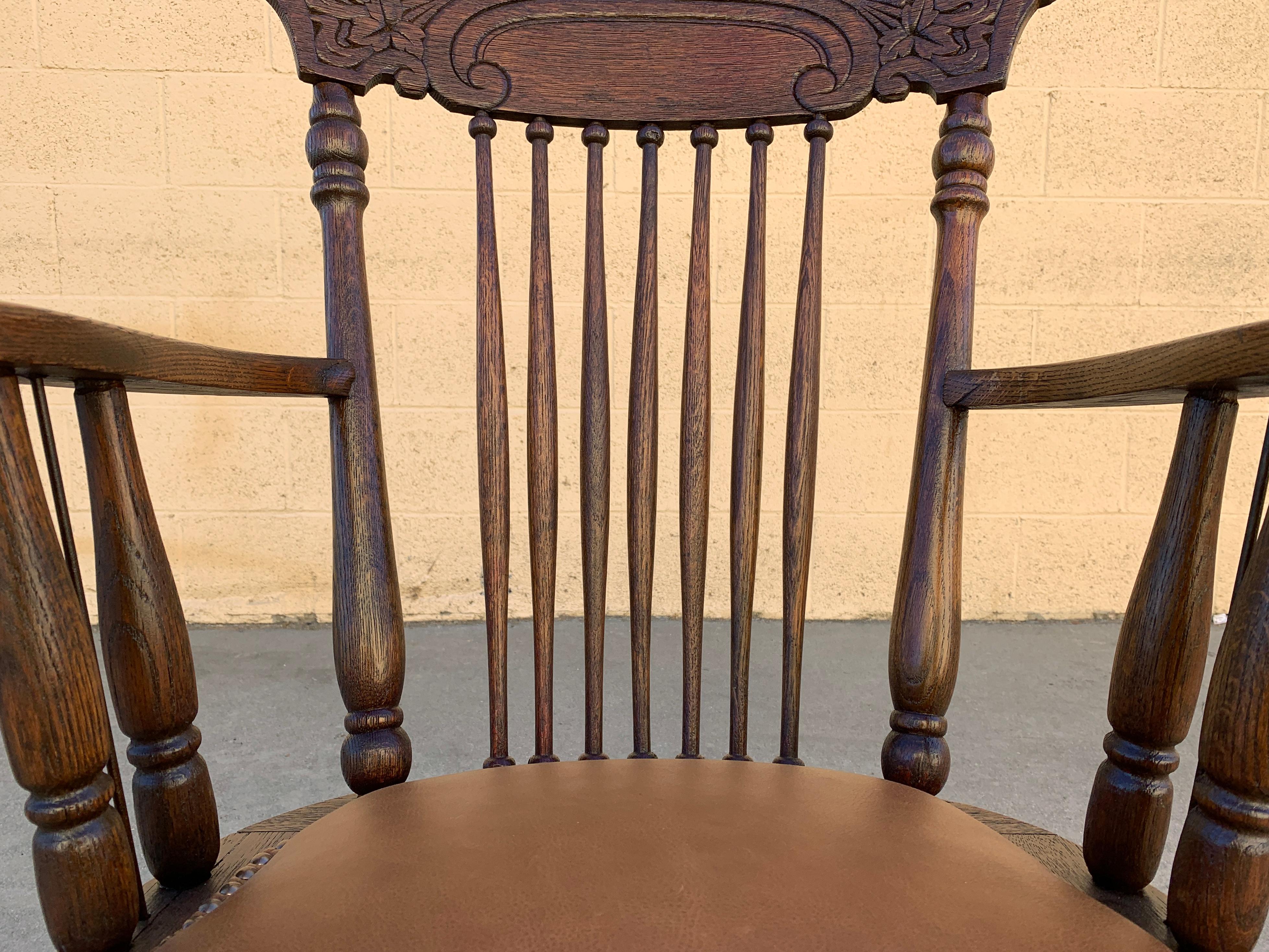 antique pressed back rocking chair