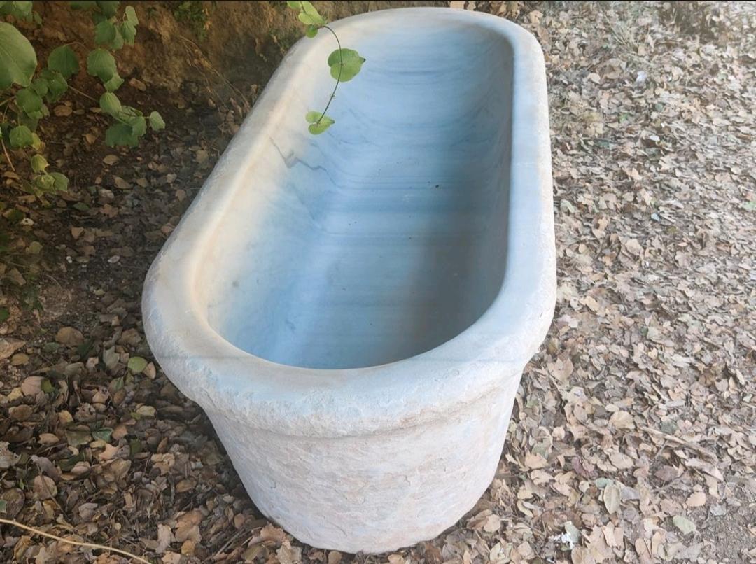 This one of a kind marble bathtub was hand-carved in Italy during the early 20th century. Throughout the years it was stored at an Italian family estate surviving two World Wars.

What is quite unique about this ancient marble tub is that its