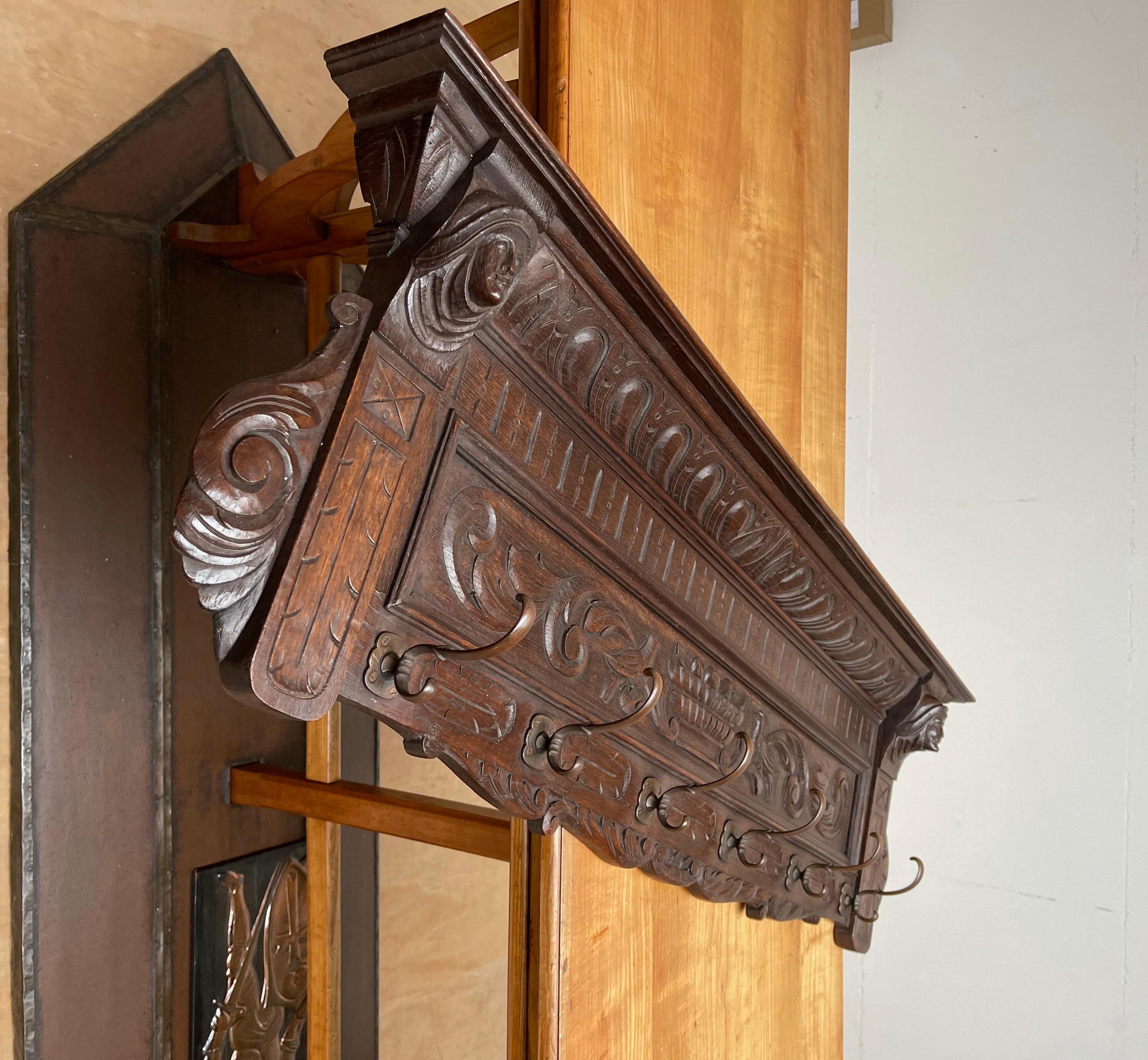 Antique and sculptural oak wall coat rack.

This beautiful antique coat rack, according to us, is about marriage and about the hope of living a fruitful and prosperous life. This could very well be a wedding gift from one very well to do